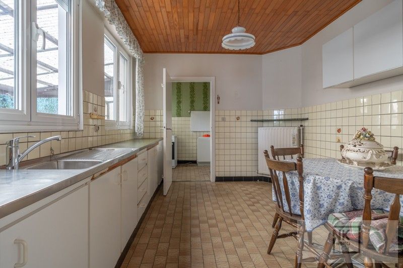 Huis met 3 slaapkamers op centrale ligging te Kasterlee op een perceel van 1055 m²! foto 14