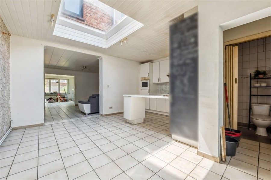 KNUSSE GEZINSWONING MET GEZELLIGE STADSTUIN IN HASSELT foto 13