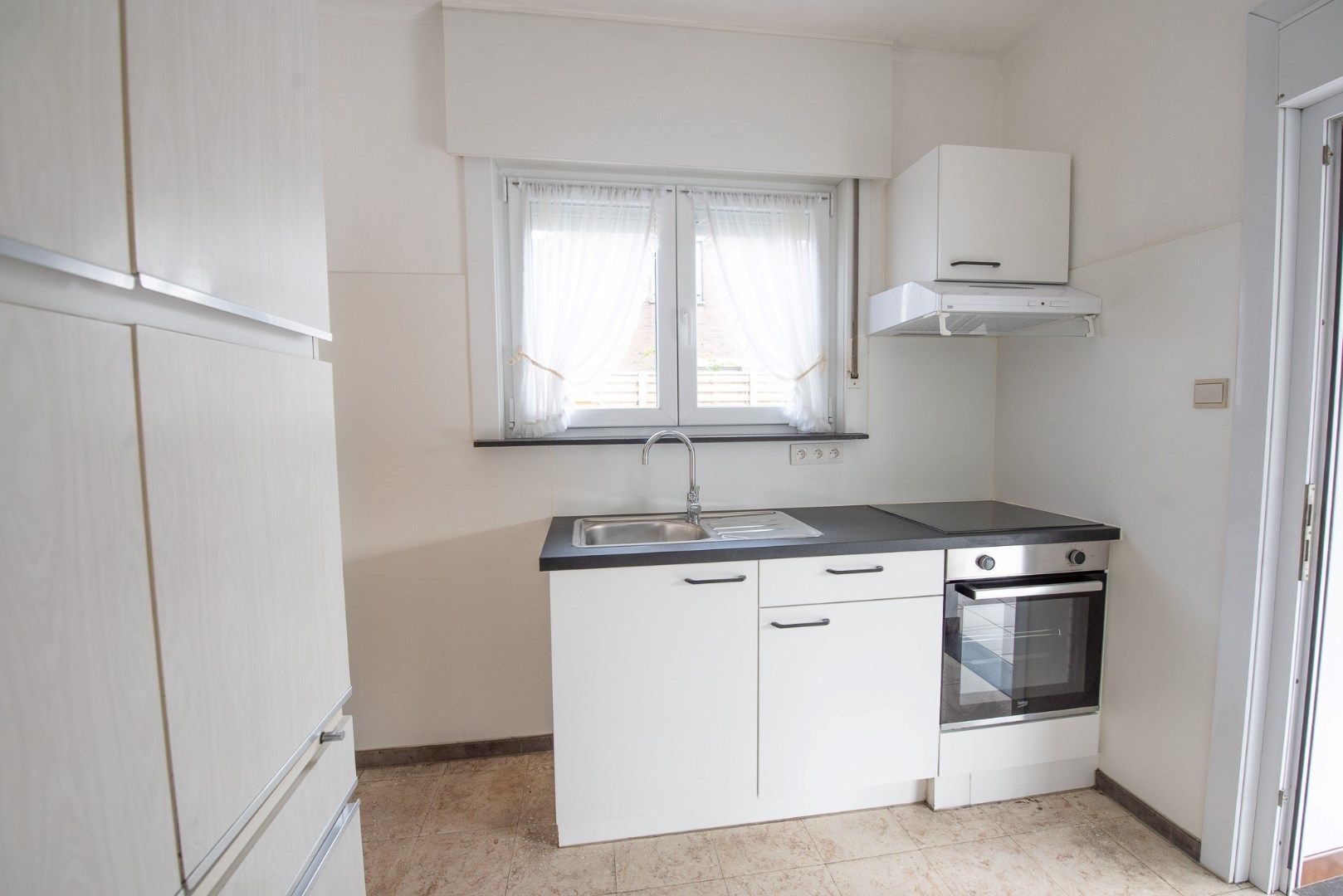 Proper onderhouden woning met 3 slaapkamers en ruimte tuin te huur in Zulte foto 8