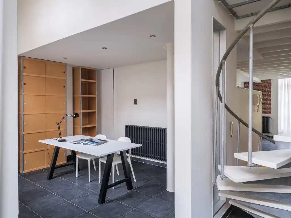 Ruime loft met industrieel karakter en twee terrassen, gelegen op de tweede bouwlijn aan de Lousbergskaai. foto 12