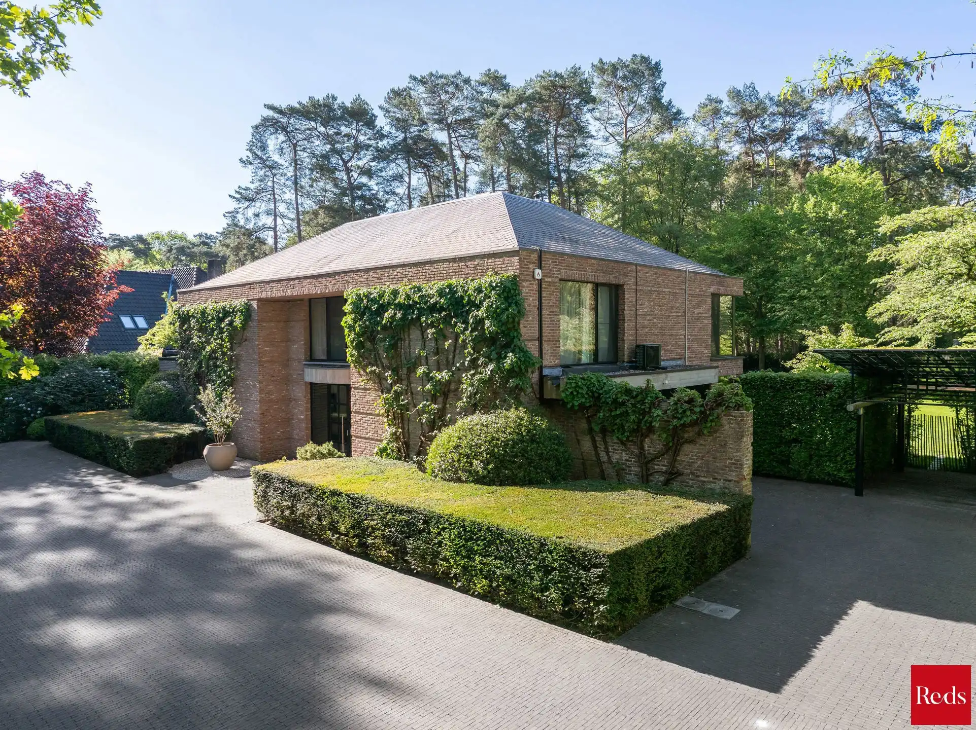 Architectenvilla met zwembad en ZW tuin in Hof Ter Linden foto 3