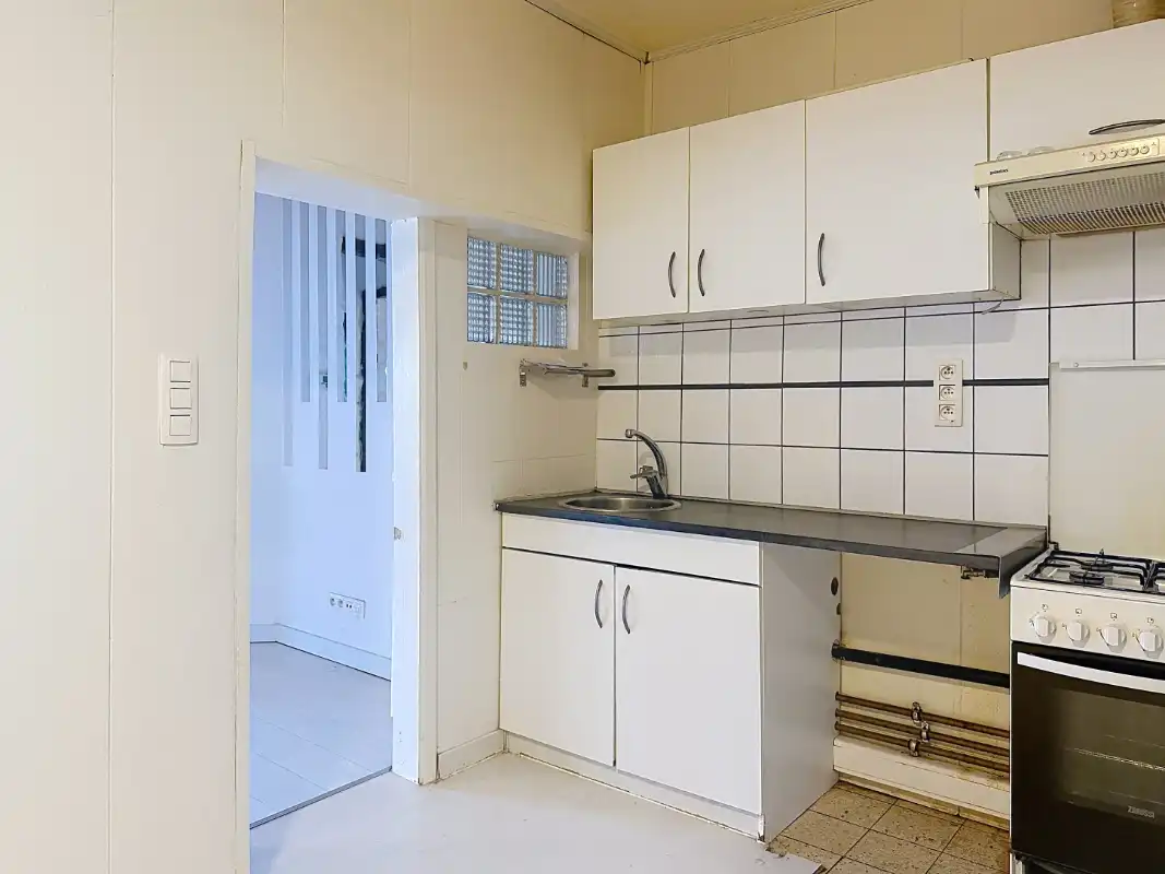Rijwoning met 3 slaapkamers en uitweg foto 5