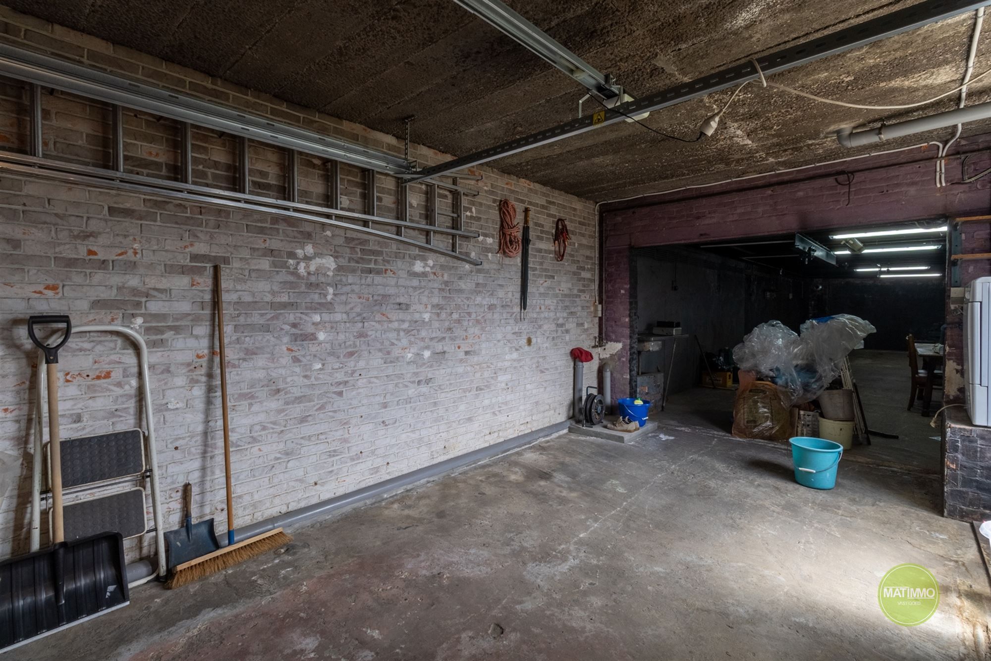 Te renoveren gezinswoning met werkhuis in Arendonk foto 19