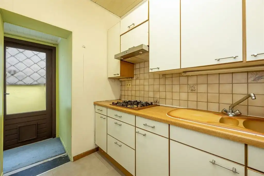 Gezellige woning met ruime garage en stadskoer foto 4