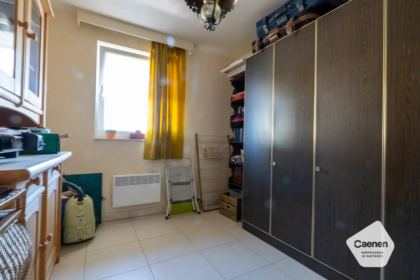 Ruim woonappartement in goede staat foto 20