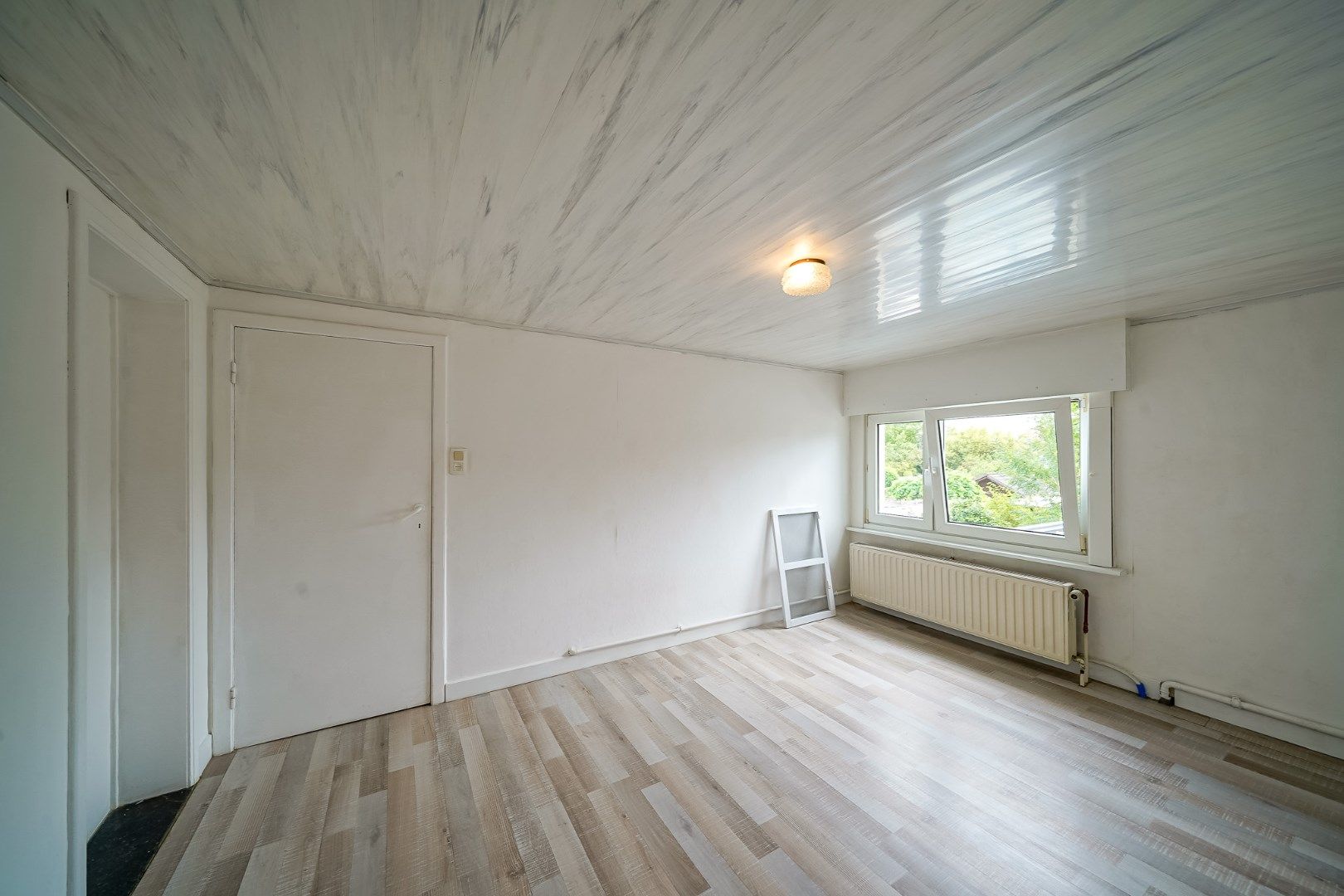 Rijwoning met 3 slaapkamers en tuin nabij de Spuikom foto 11