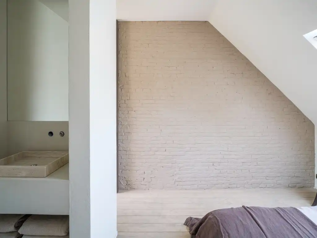 Uniek handelshuis met centrale ligging, bestaande uit een polyvalente kantoorruimte en een bovengelegen duplexappartement. foto 9