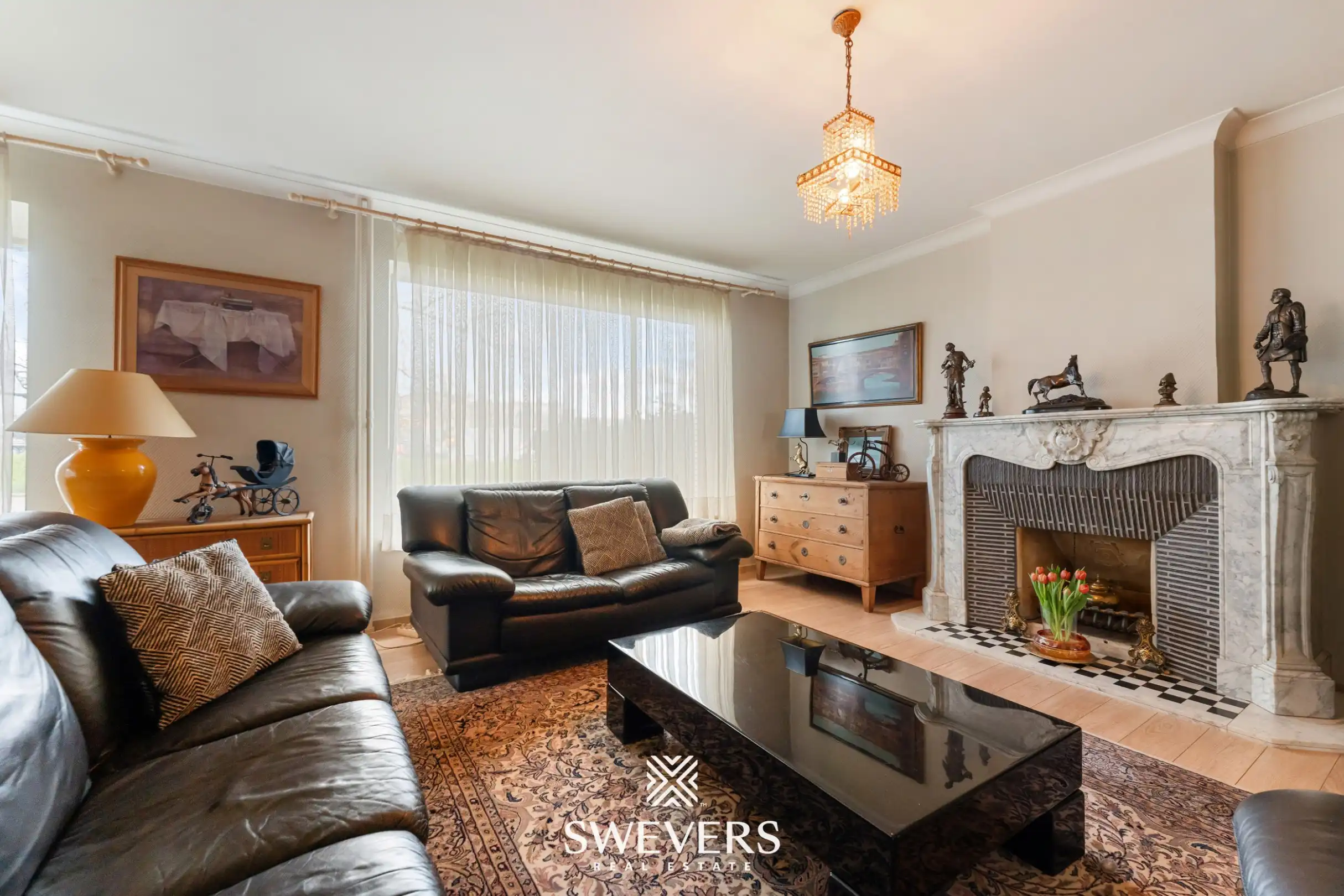 Ruime halfopen bebouwing met 4 slaapkamers en veel renovatiepotentieel op topligging in Hasselt foto 2