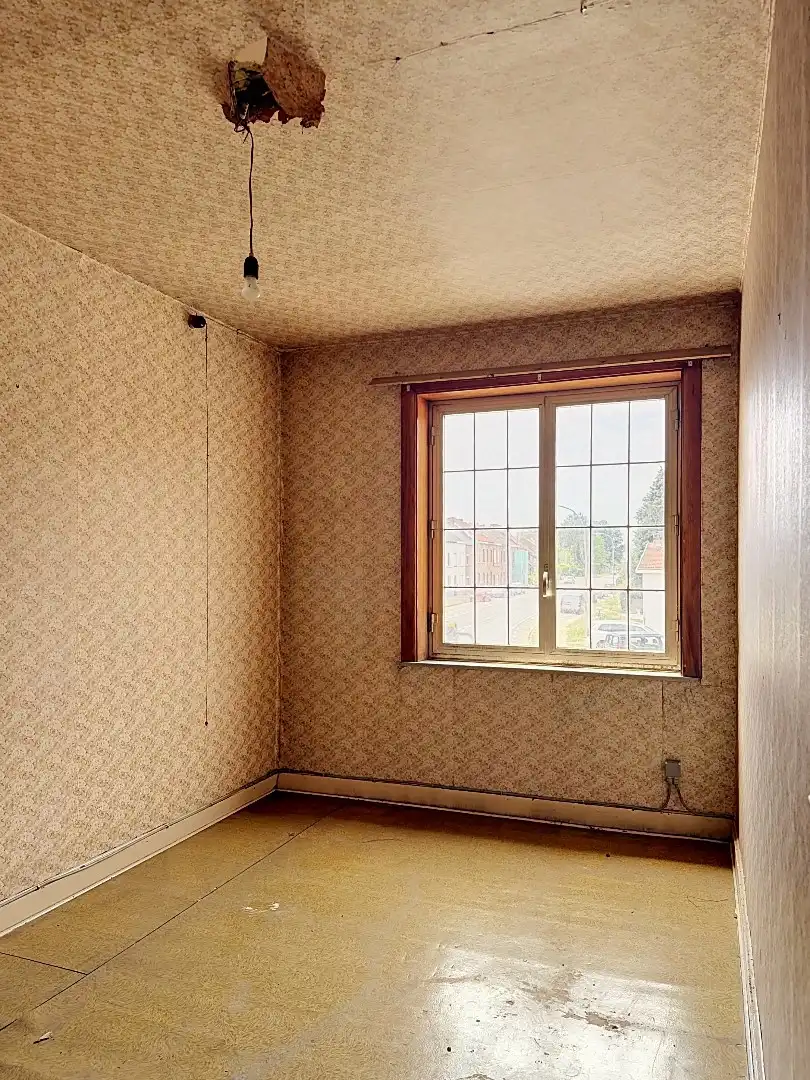 Te renoveren gezinswoning met ruime tuin in Tienen foto 12