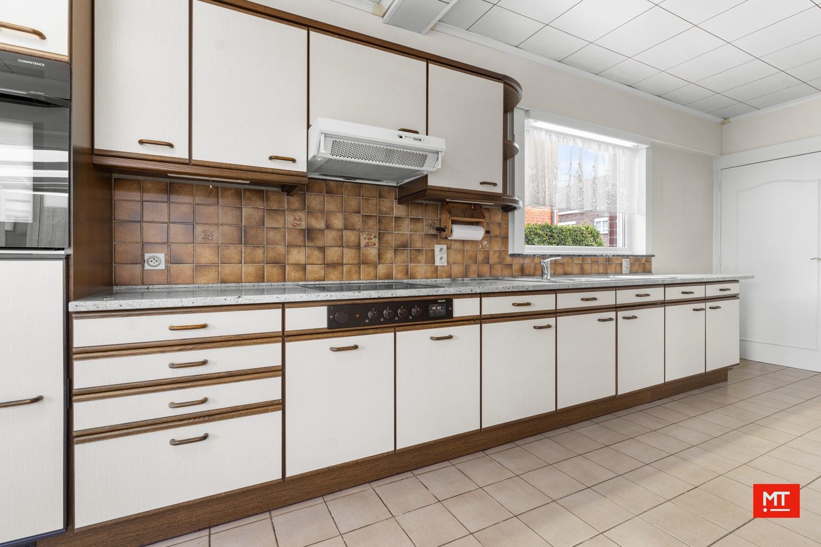 Te renoveren alleenstaande woning met 3 slaapkamers, Westgerichte tuin en garage in het centrum van Passendale foto 9
