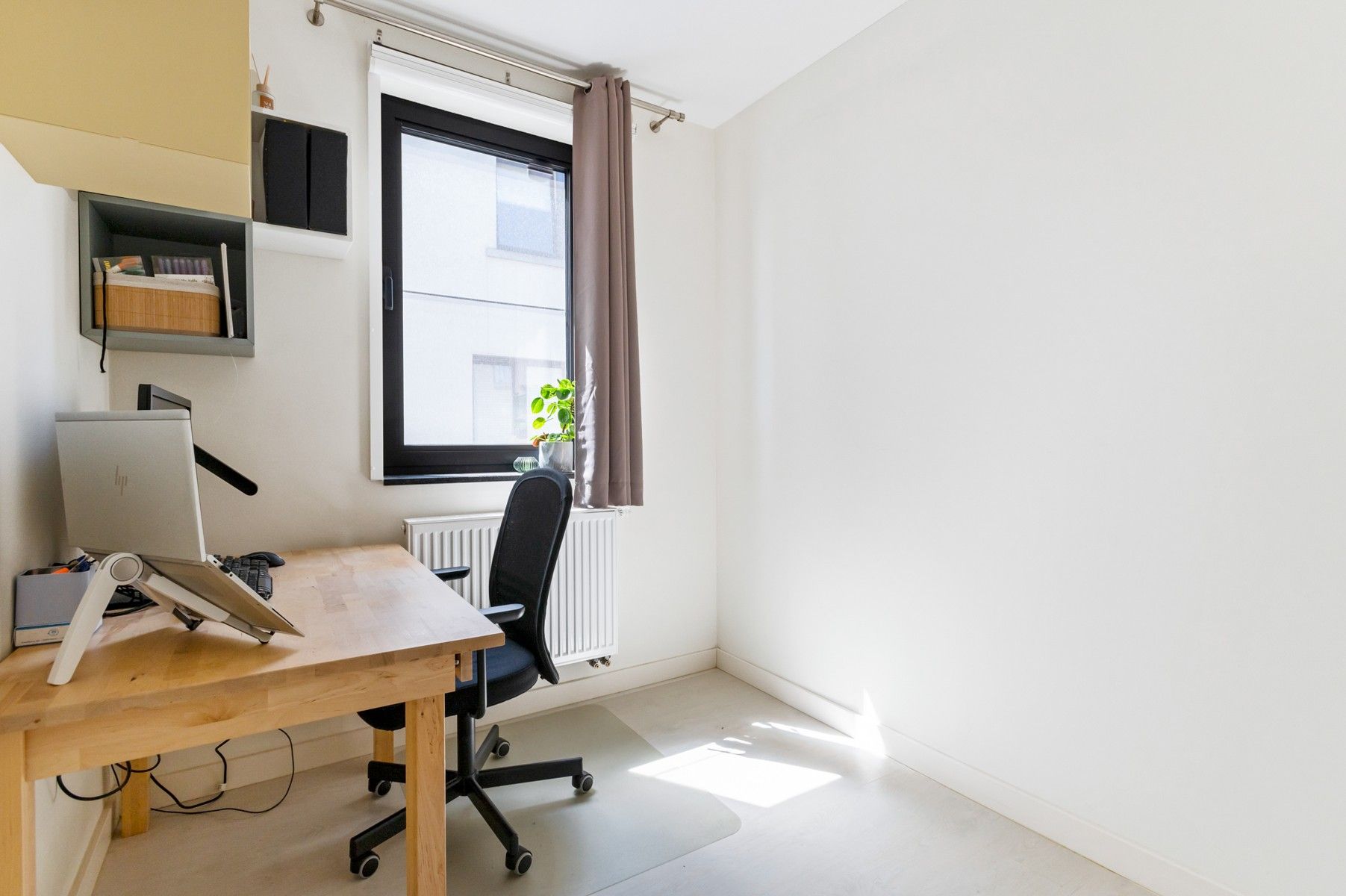 Instapklaar gelijkvloersappartement met tuin foto 11