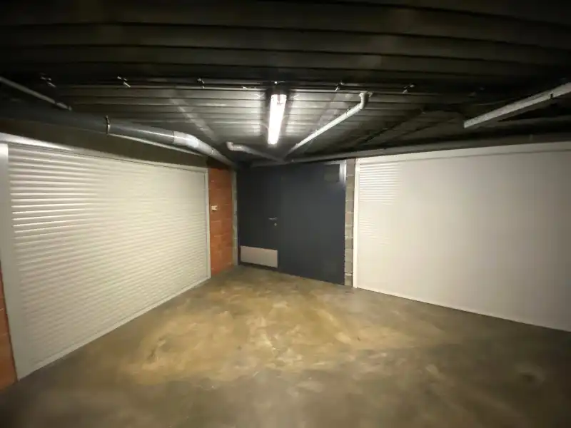 Recent ideaal gelegen volledig gerenoveerd appartement HARTJE Geel 2 slpk, met autostaanplaats foto 17