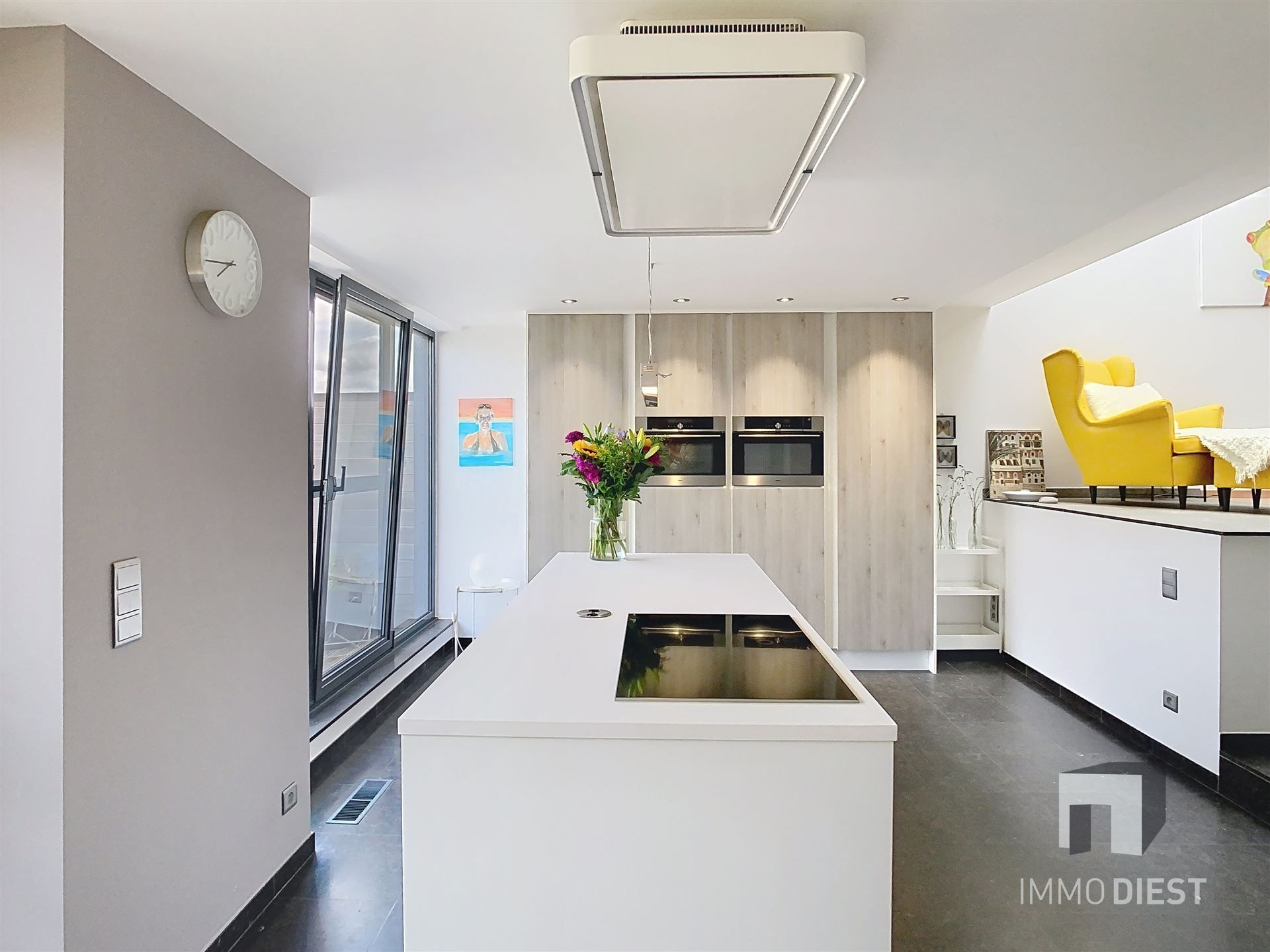 Hippe splitlevel met 3 slaapkamers in hartje Zichem. foto 6