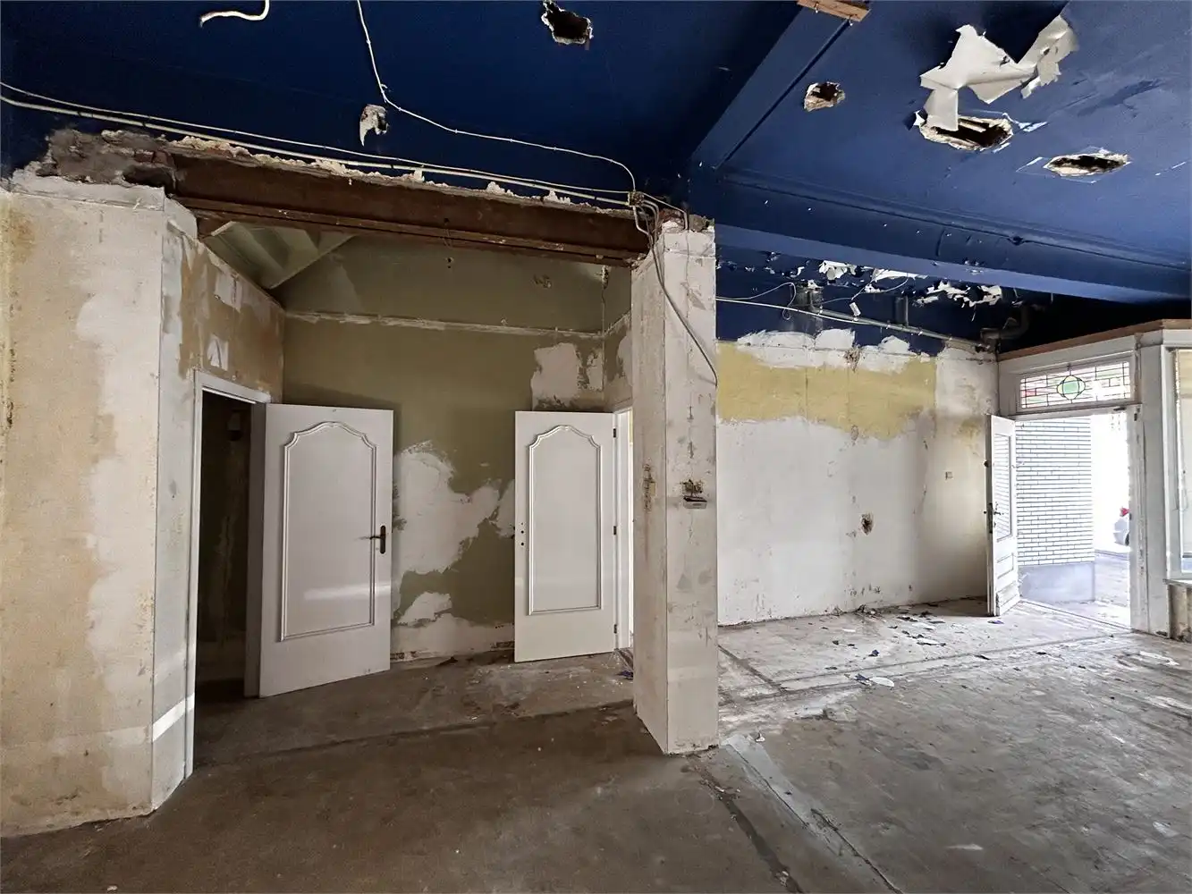 Te renoveren handelshuis met woonst foto 11