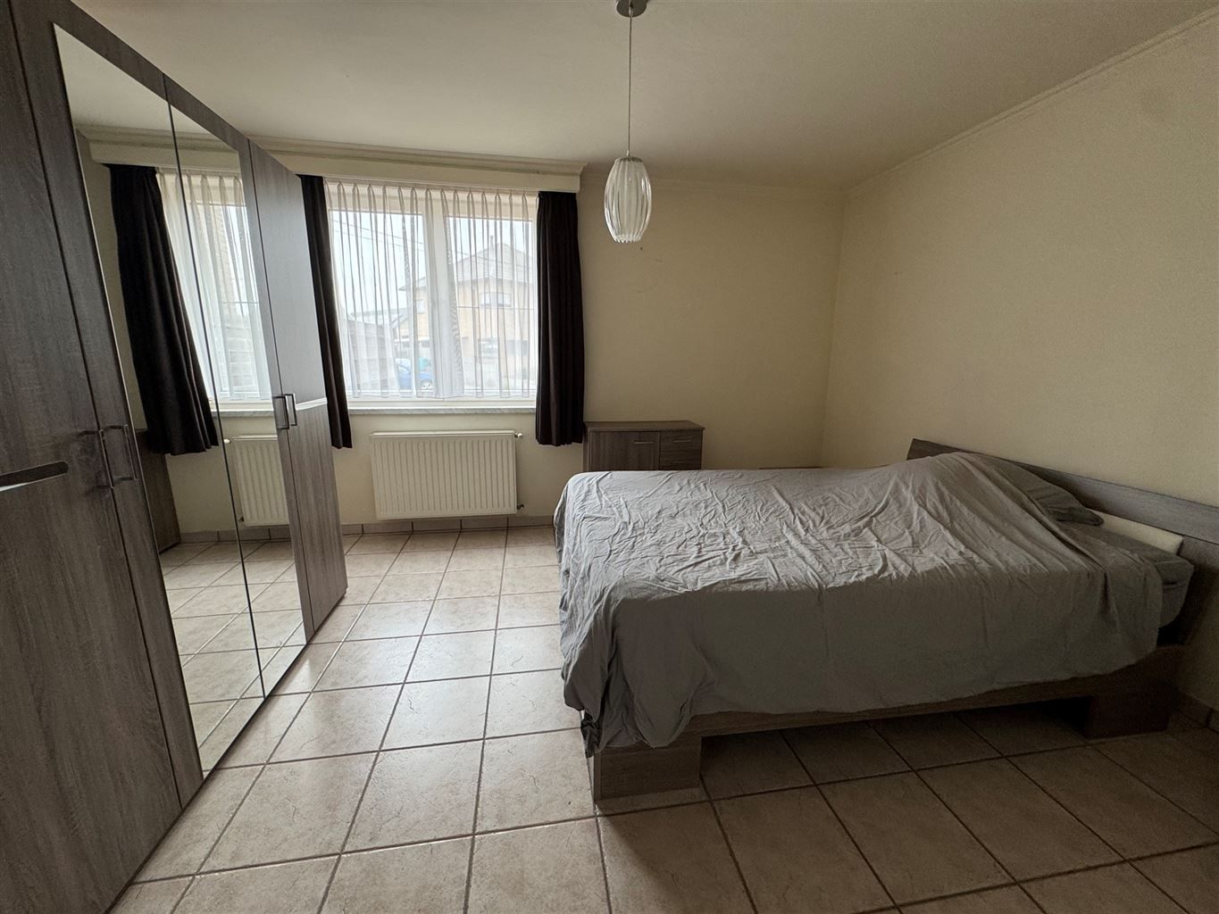 Ruim gelijkvloers appartement met 2 slaapkamers, terras en autostaanplaats te Kinrooi.  foto 7