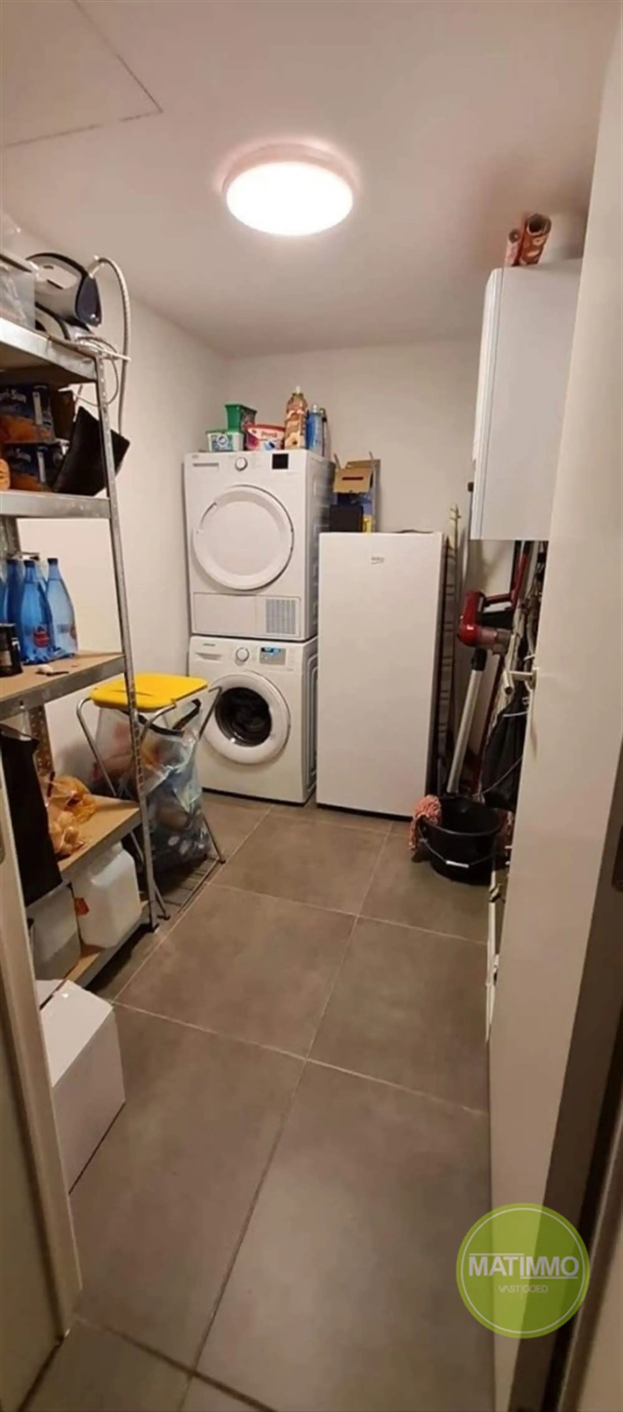 Modern gelijkvloers appartement met 2 slaapkamers in Geel foto 17