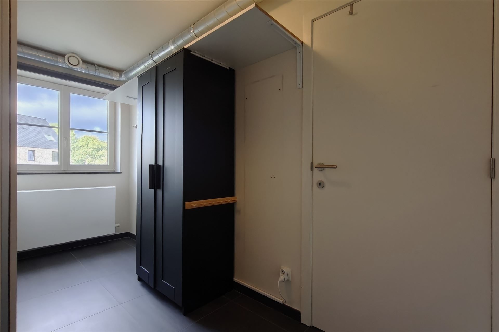 Ruime duplex (197m²) in een residentiële woonwijk te Munsterbilzen foto 10