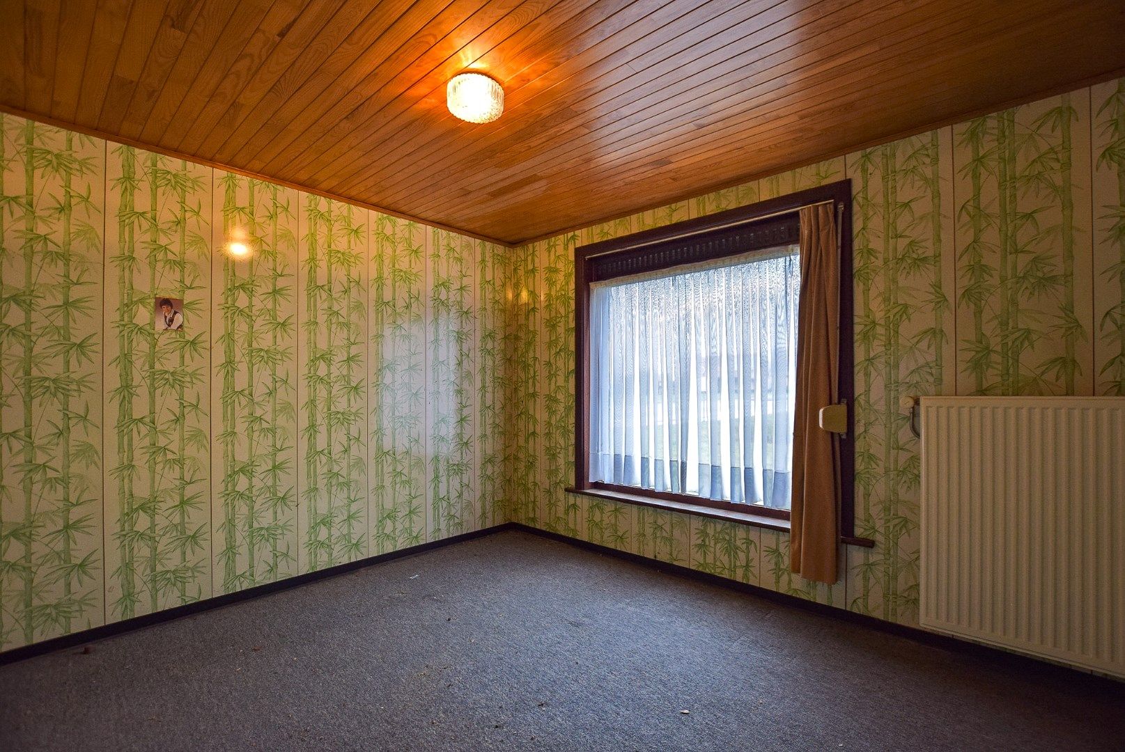 Gezellige woning te koop in Hoogstade met zongerichte tuin en zijtoegang. foto 16