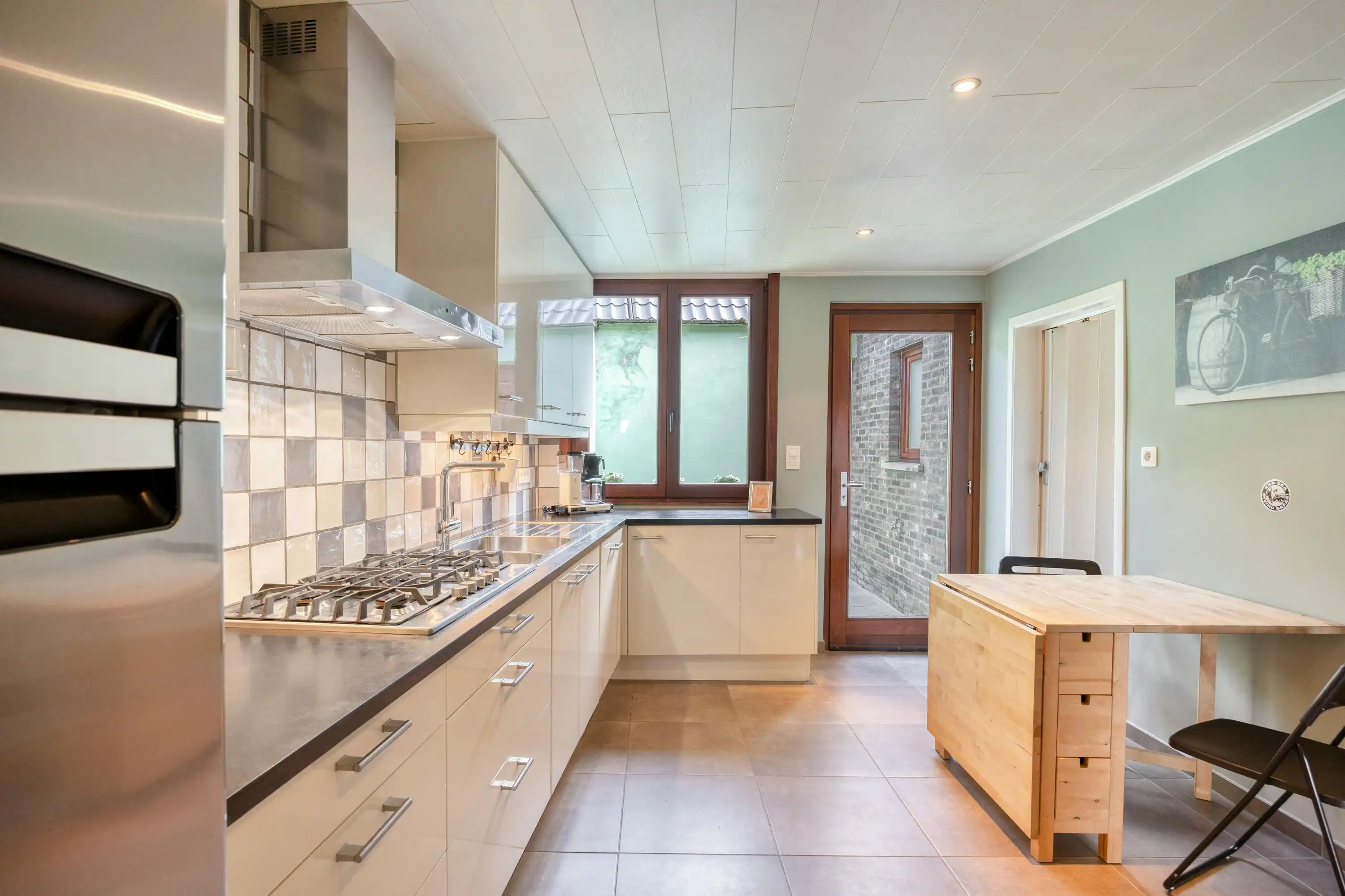 Gerenoveerd huis te koop in het centrum van Kruibeke foto 9
