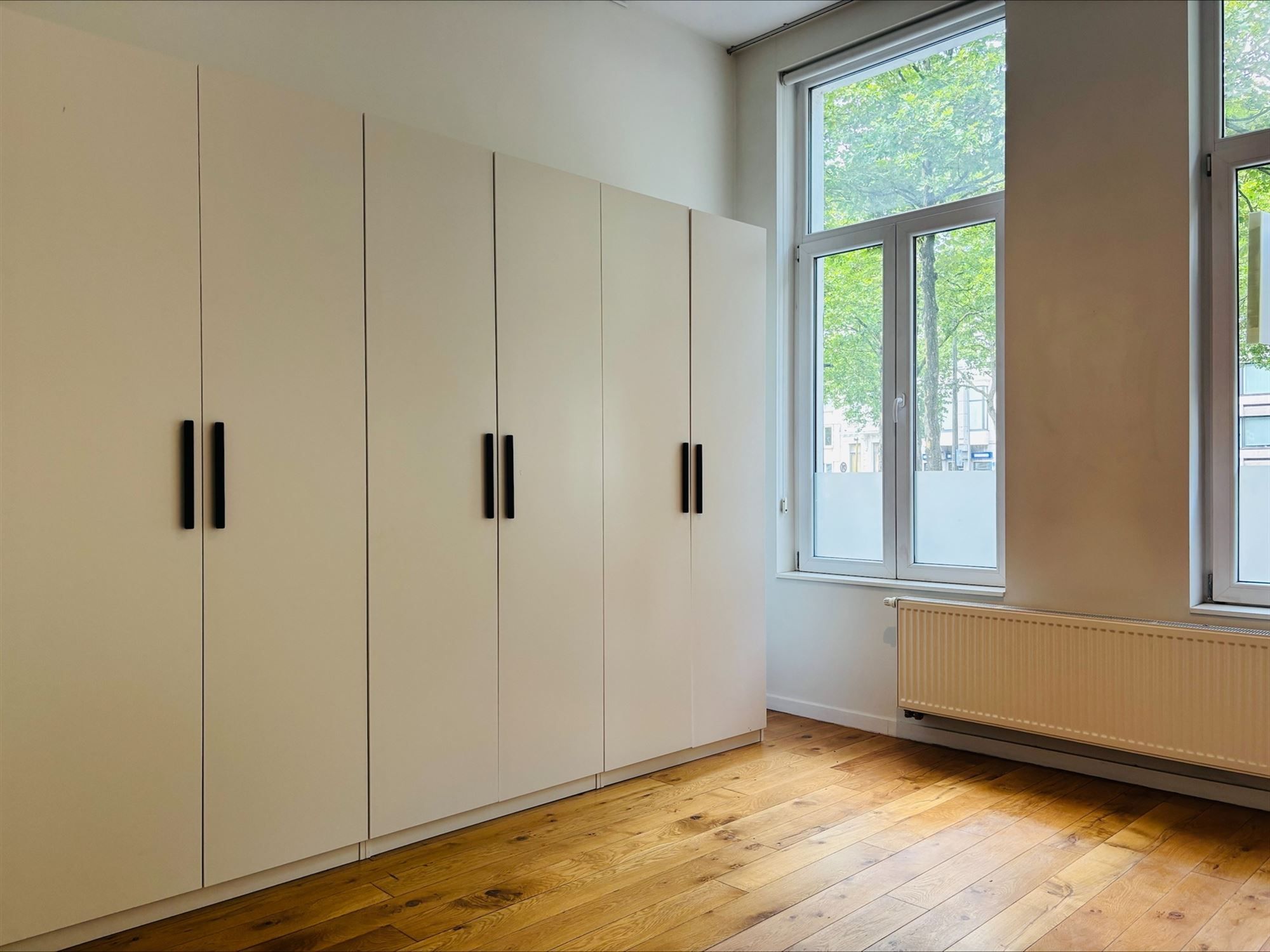 Karaktervol en lichtrijk 1-slaapkamerappartement met ruim terras op toplocatie! foto 10