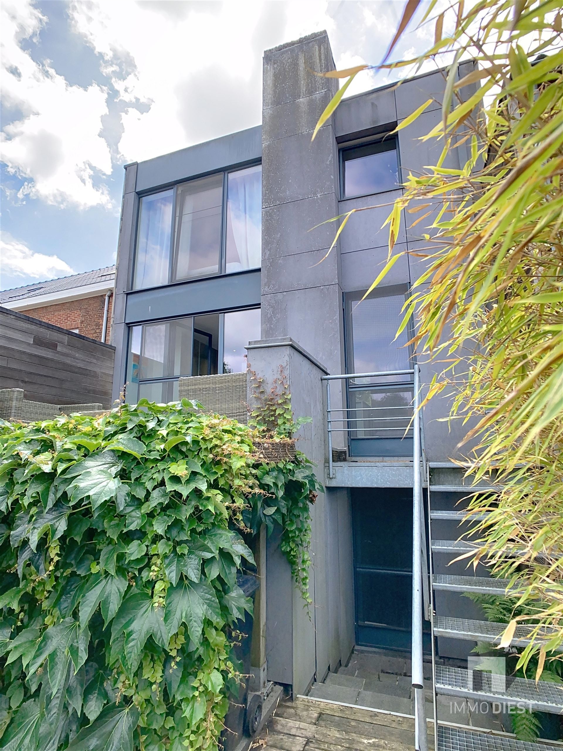 Hippe splitlevel met 3 slaapkamers in hartje Zichem. foto 31