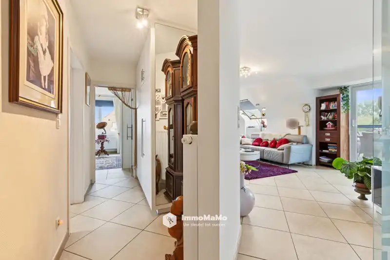 RUIM DAKAPPARTEMENT MET 3 GARAGES EN ZALIG DAKTERRAS TE KOOP foto 3
