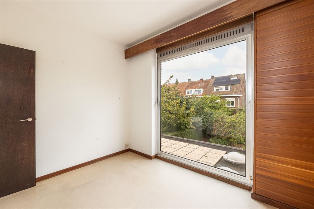 Unieke jaren 80-woning met ruime tuin foto 16