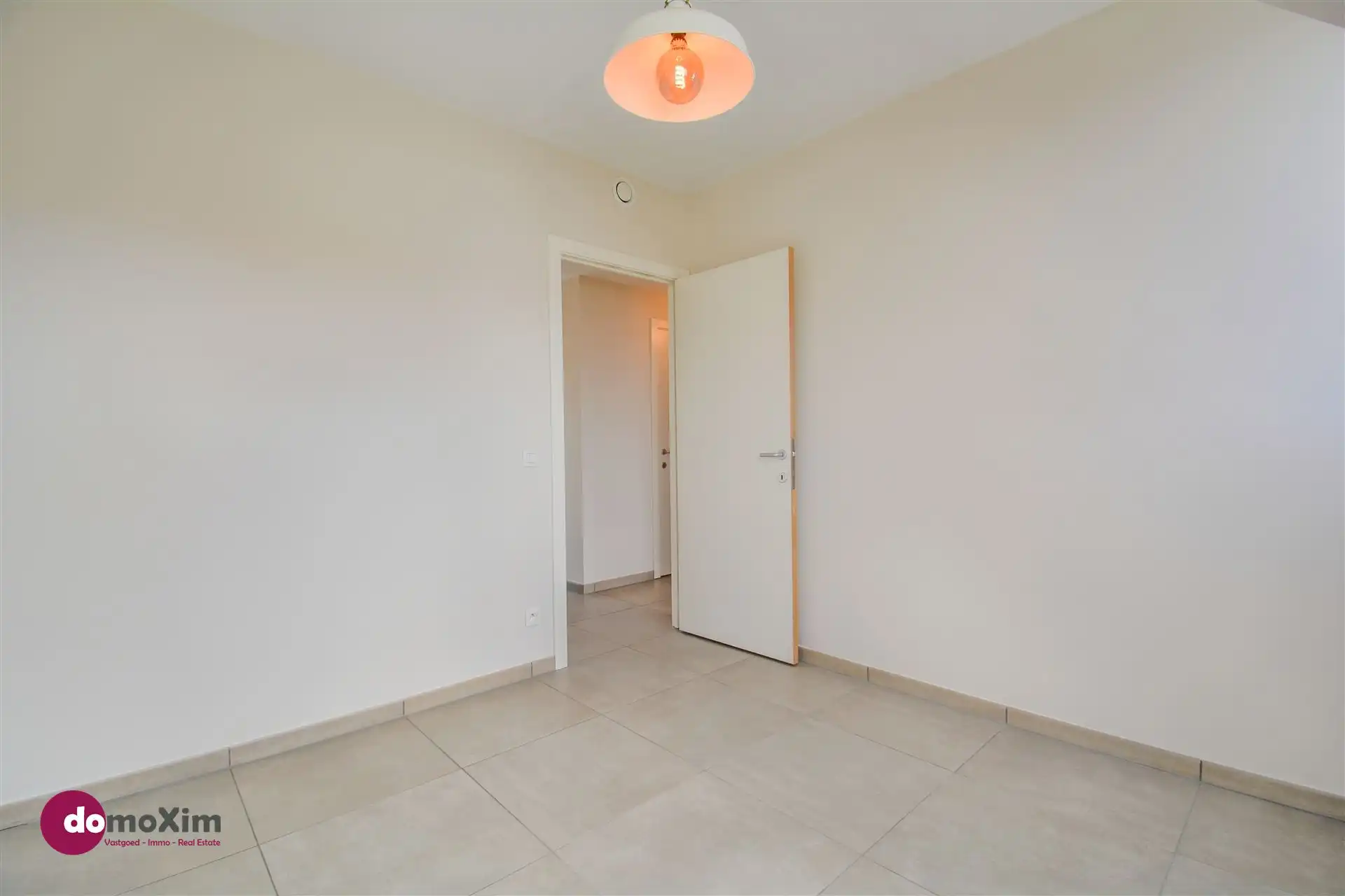 Appartement met 2 slaapkamers & terras in het centrum van Boortmeerbeek foto 6