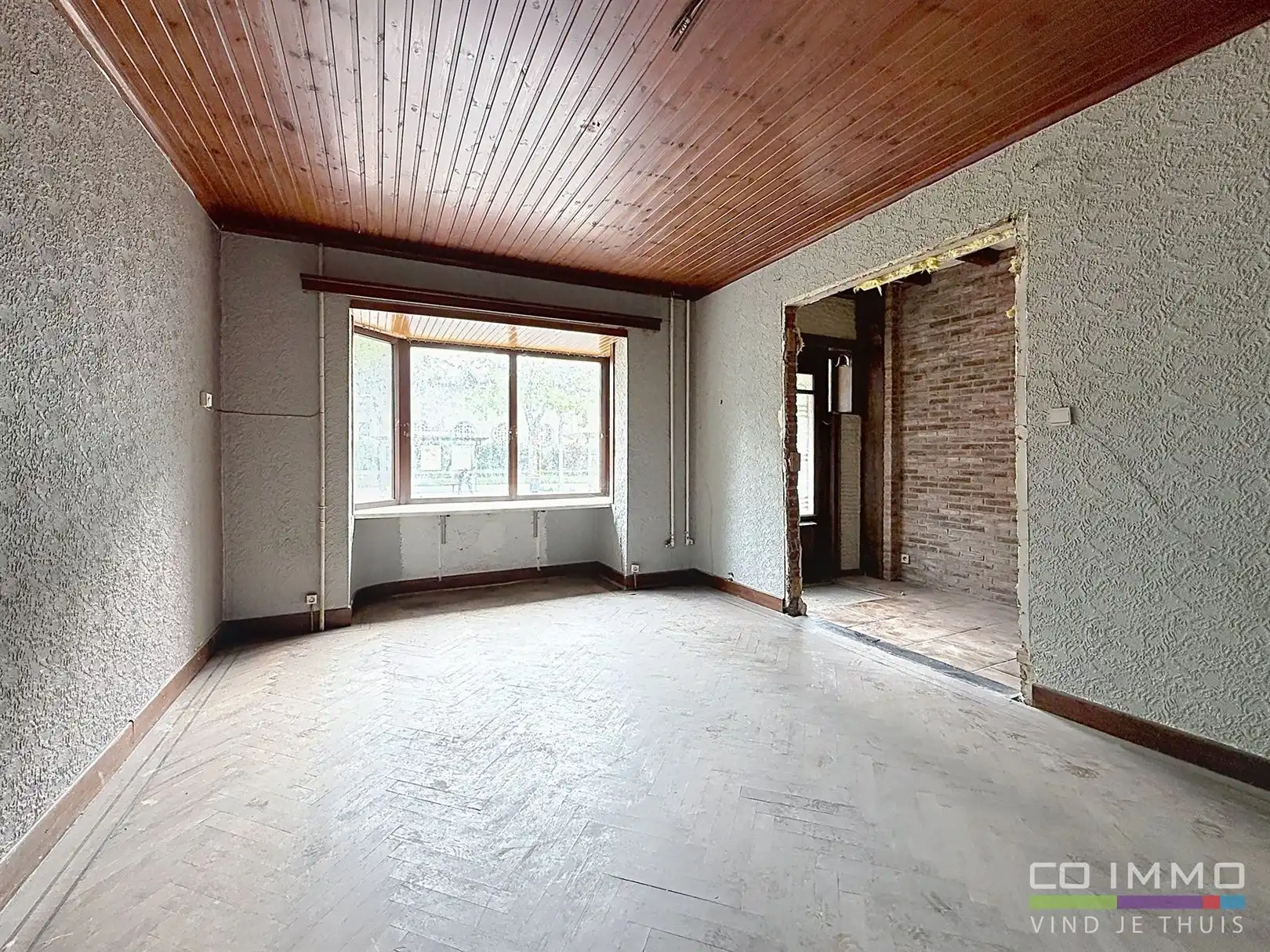 Ruime stadswoning met tuin, te renoveren, 2a 68ca foto 8