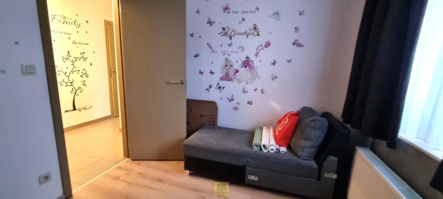 Recent appartement met 2 slaapkamers én autostaanplaats nabij station! foto 12