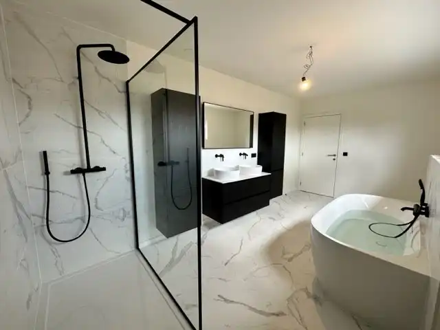 Comfortabele, hoog afgewerkte en energiezuinige nieuwbouwwoning gelegen in een rustige omgeving in Neeroeteren.  foto 17