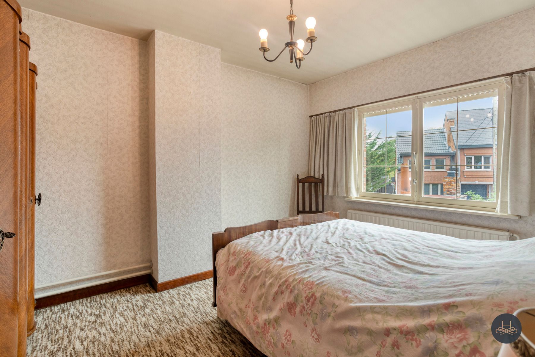 Halfopen woning met tuin en renovatiepotentieel foto 16