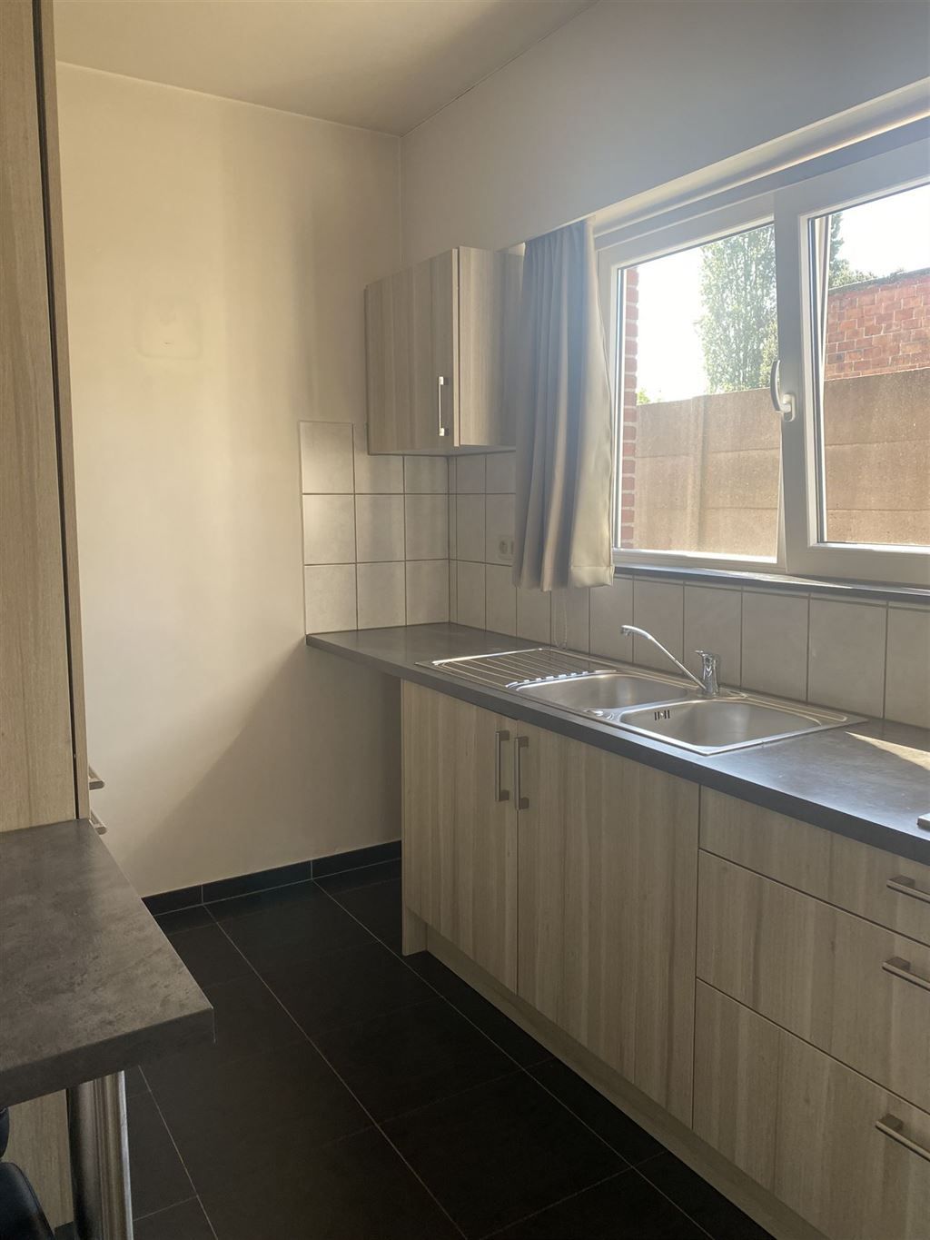 Gelijkvloers appartement in rustige straat foto 4