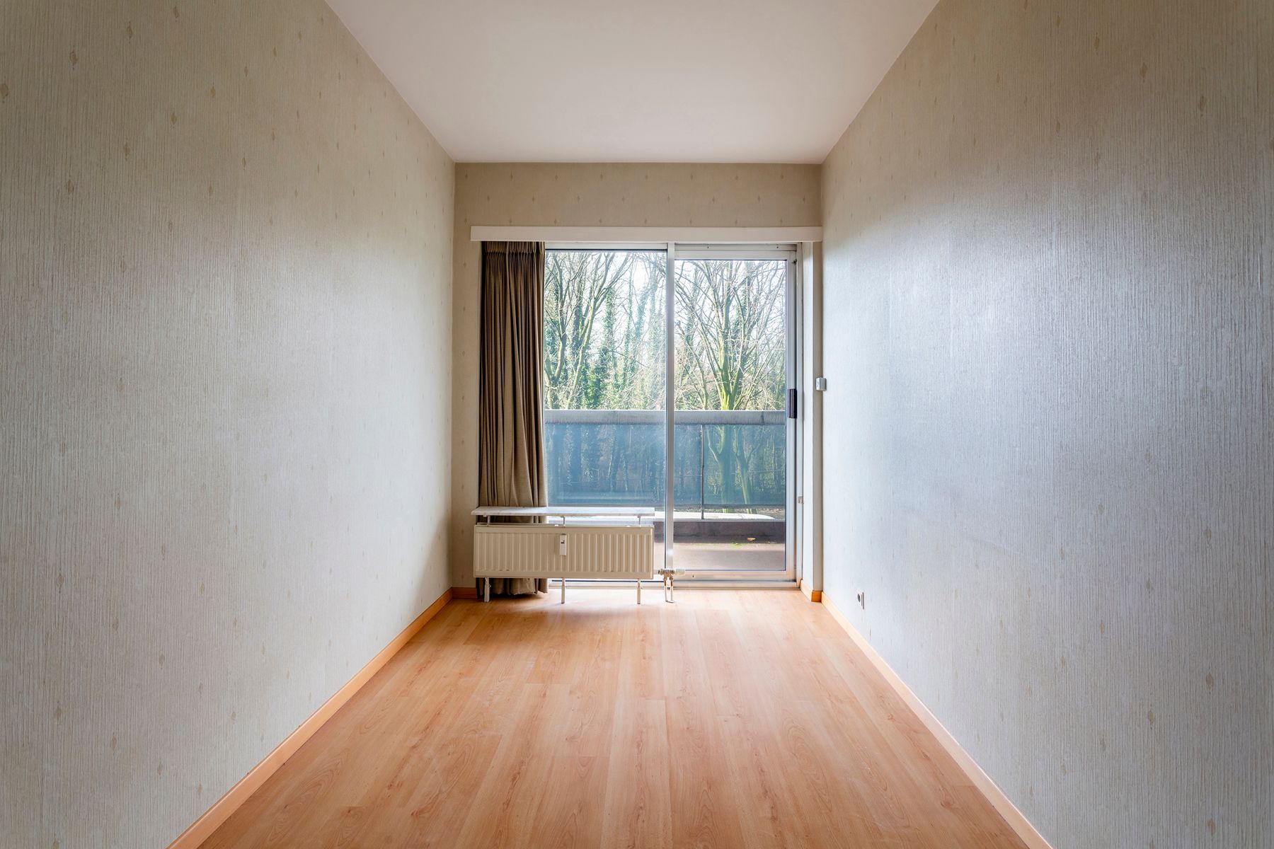 Lichtrijk appartement in het groen met renovatiepotentieel foto 12