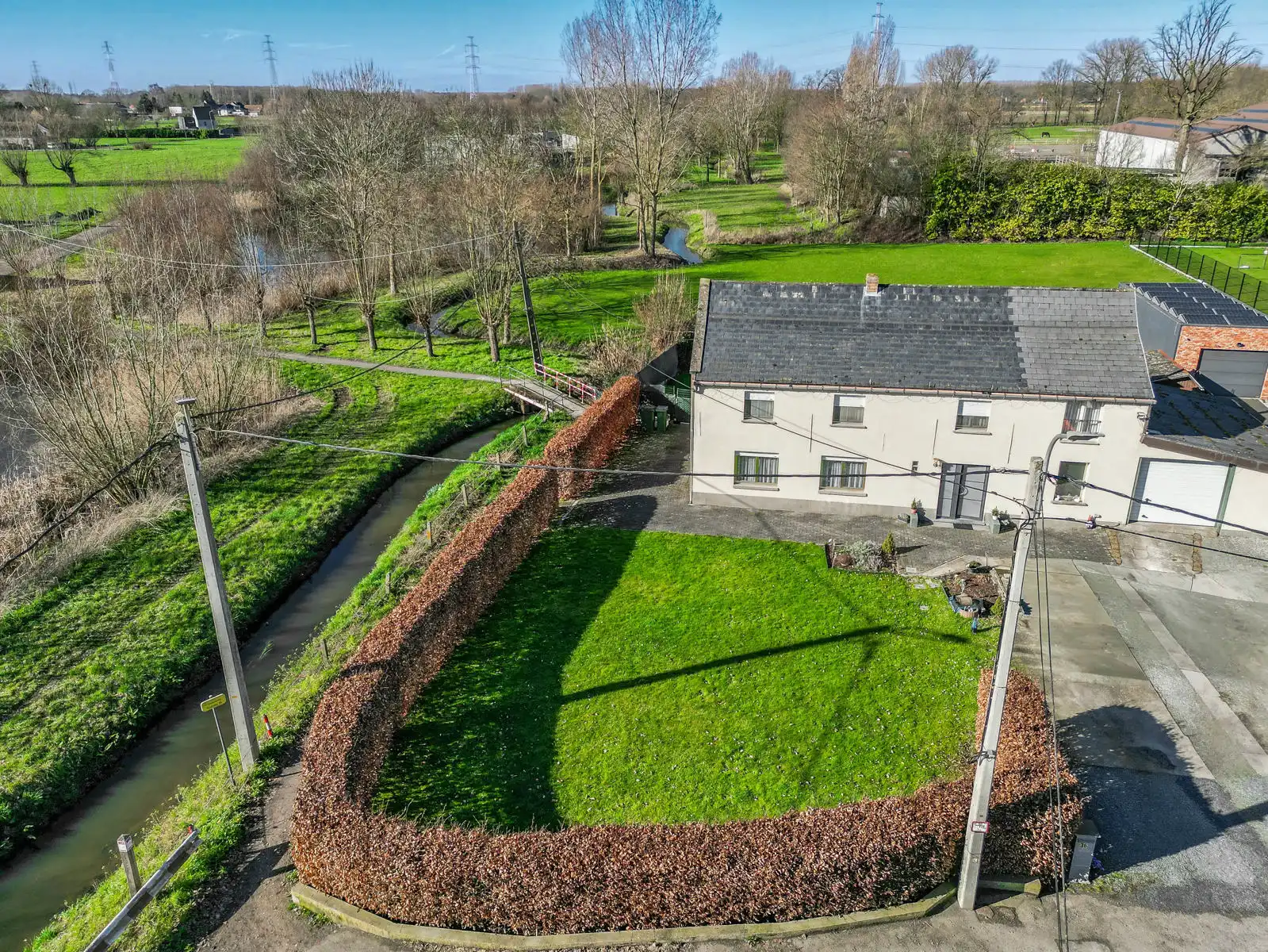 Prachtig gelegen te renoveren open bebouwing op een mooi perceel van 1310m² te Londerzeel foto 2