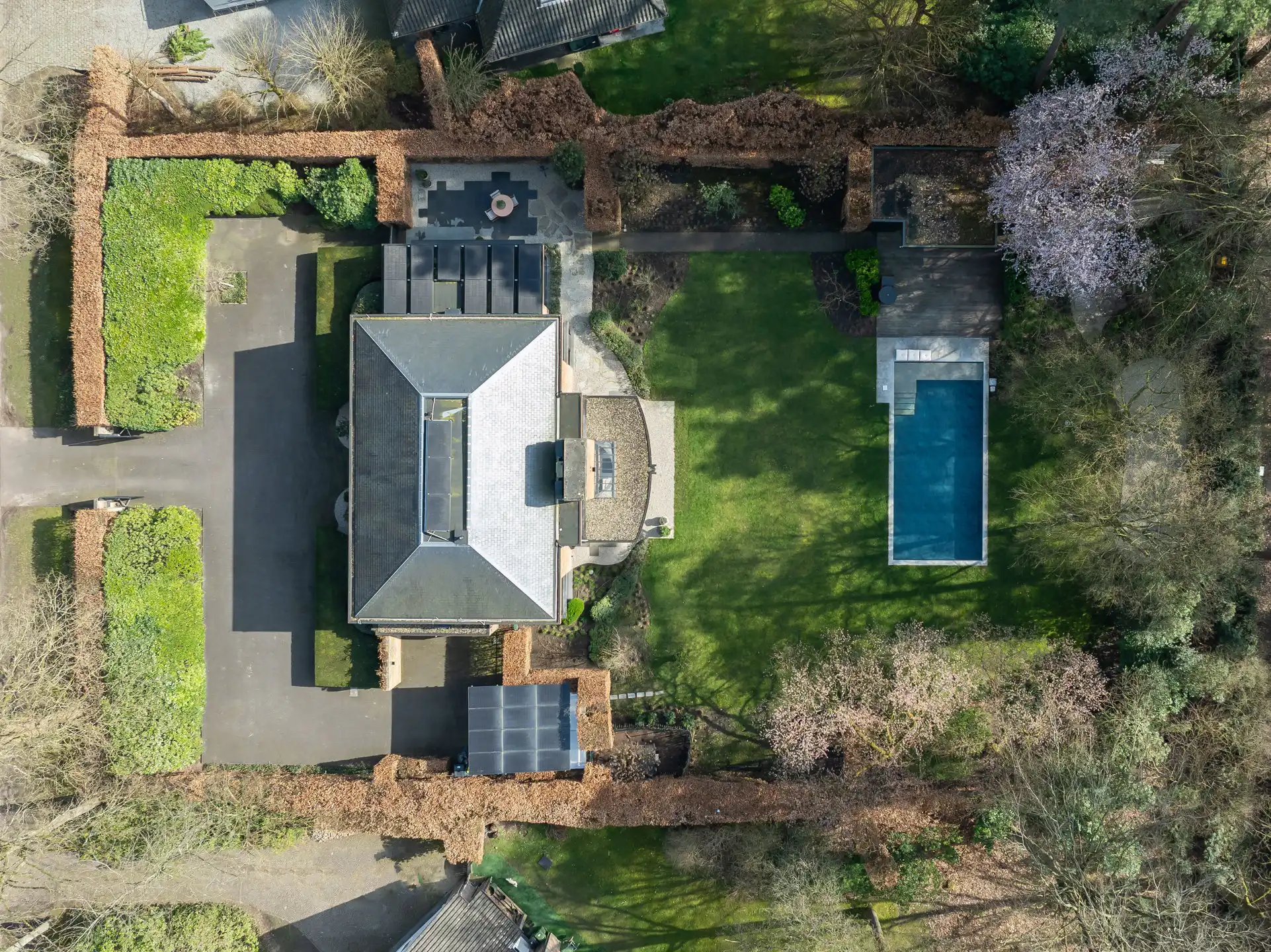 Architectenvilla met zwembad en ZW tuin in Hof Ter Linden foto 60