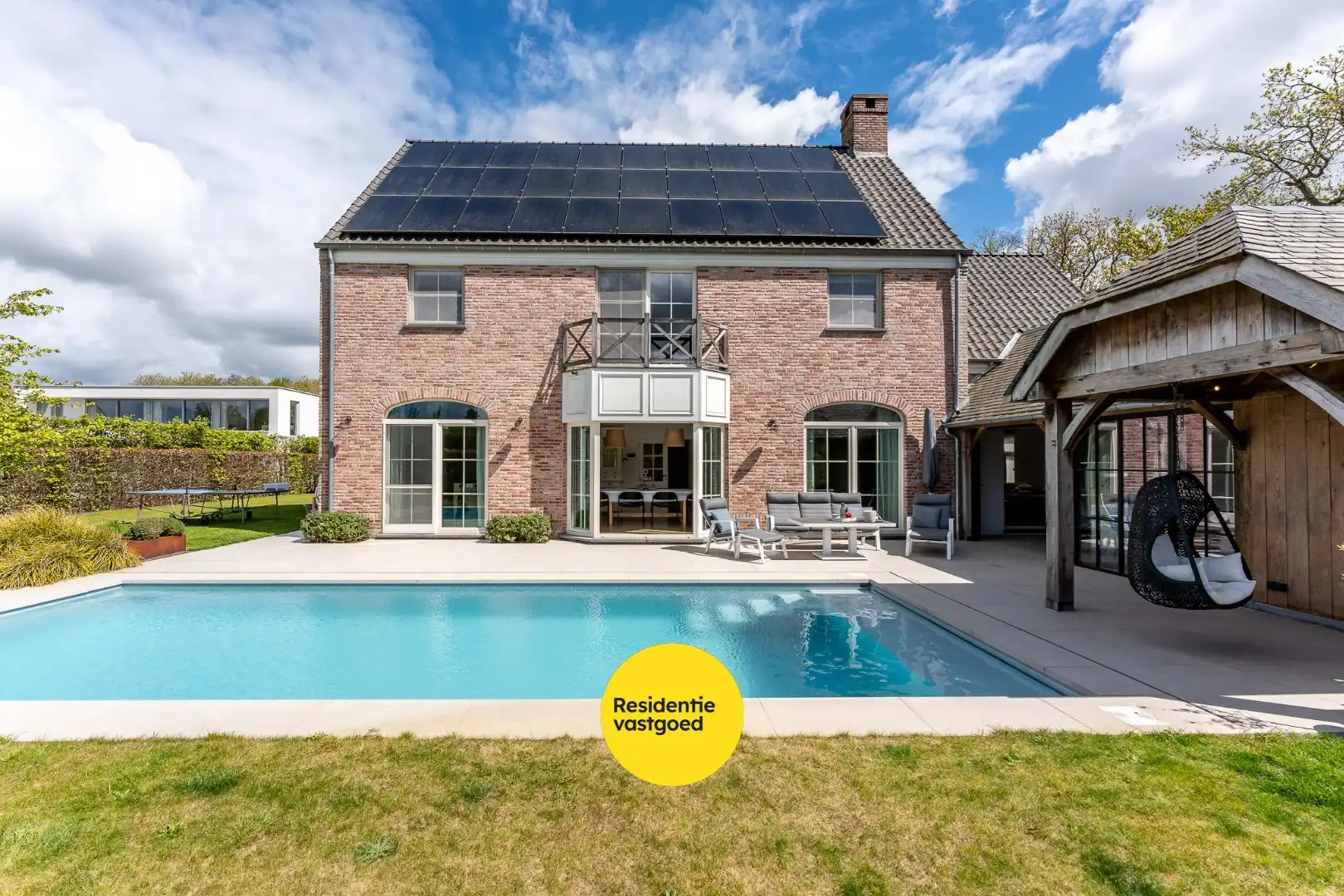 Exclusieve villa met zwembad en poolhouse in de nieuwe St-Annawijk te Sint-Andries foto 15