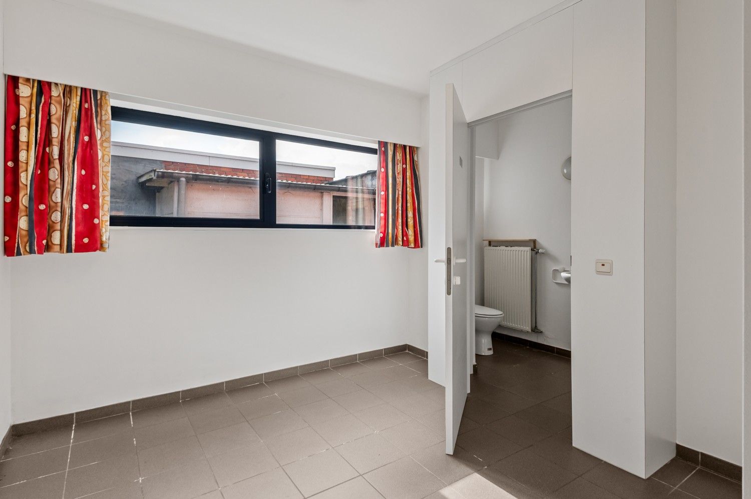 Handelspand met duplex in het centrum van Wijnegem! foto 9