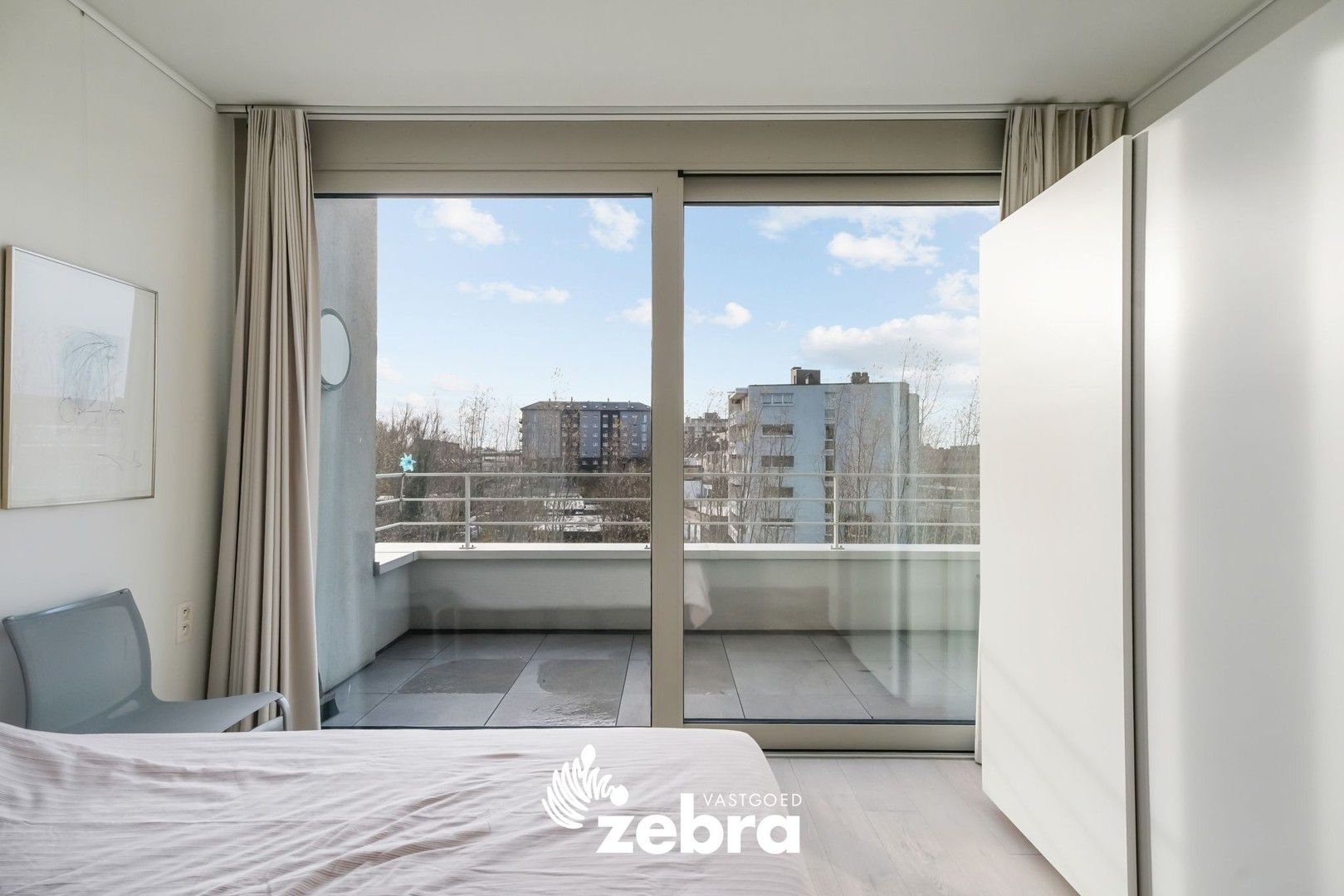 Moderne serviceflat met prachtig zicht op de Leie en autostaanplaats te Deinze! foto 13