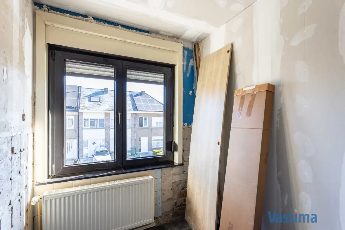 Lichtrijke halfopen bebouwing met 3 slaapkamers, tuin en garage foto 19