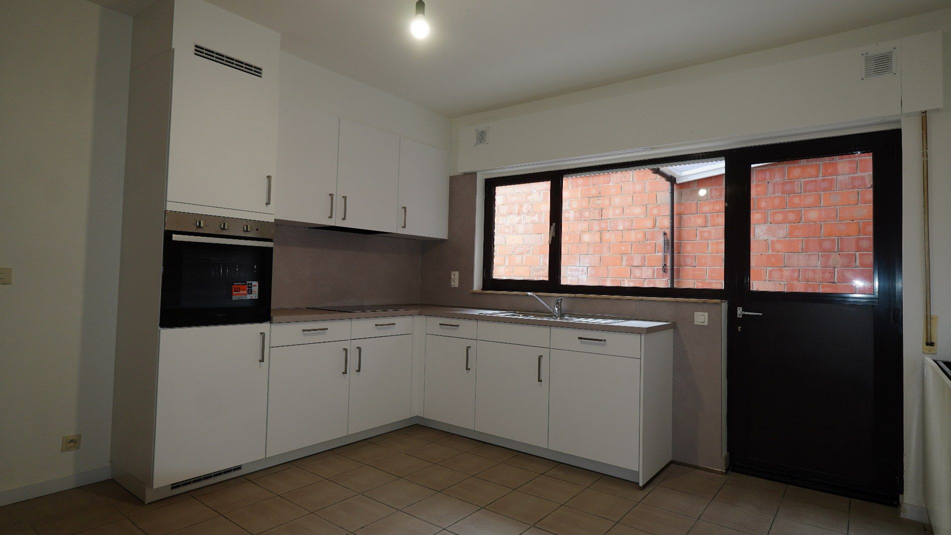 Gerenoveerd gelijkvloers appartement te Lokeren  foto 3