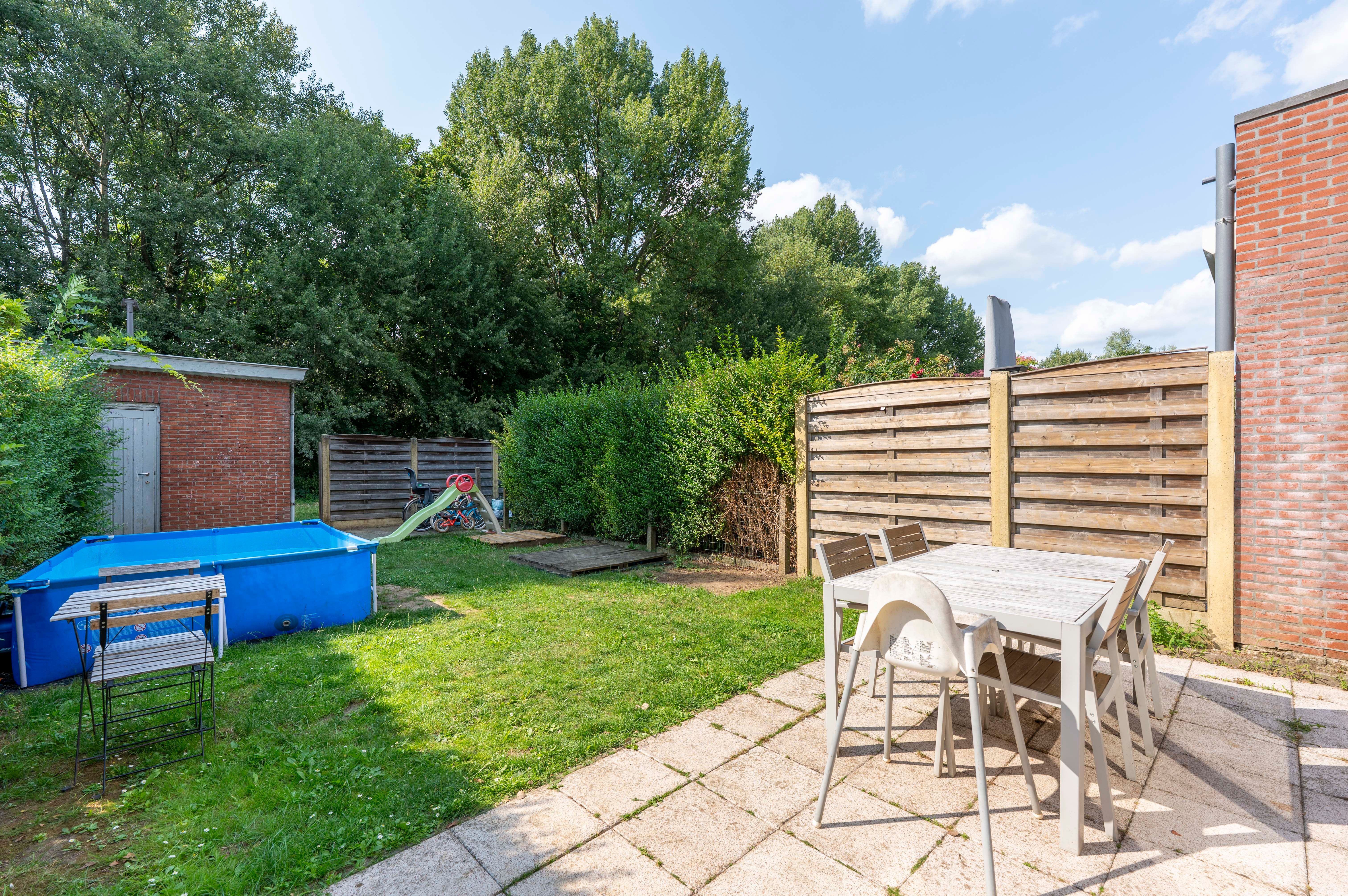 Instapklare gezinswoning met tuin en achteringang op centrale locatie in Ekeren! foto 14