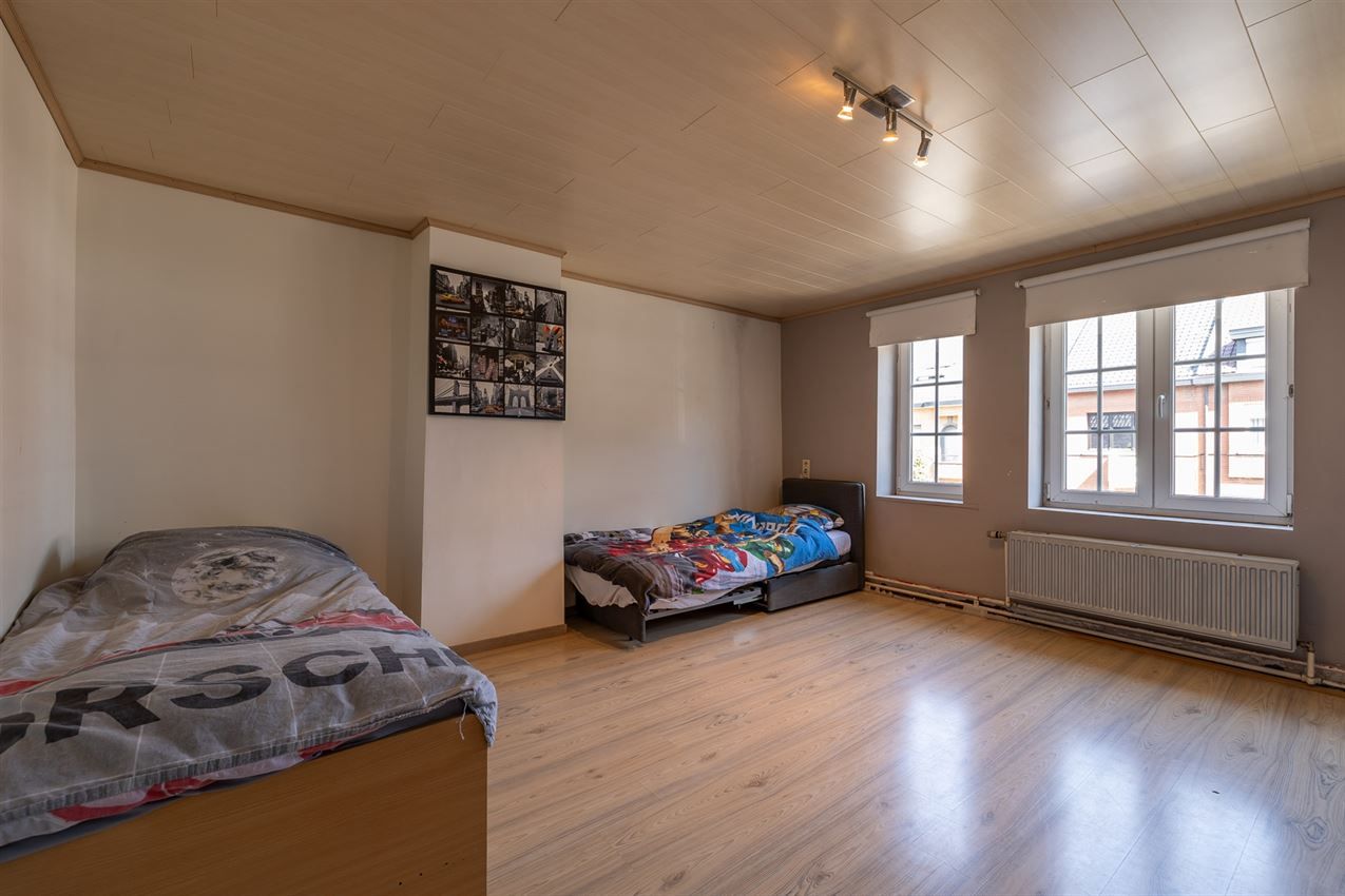 Stadswoning met 3 slpk., tuin en garage foto 18