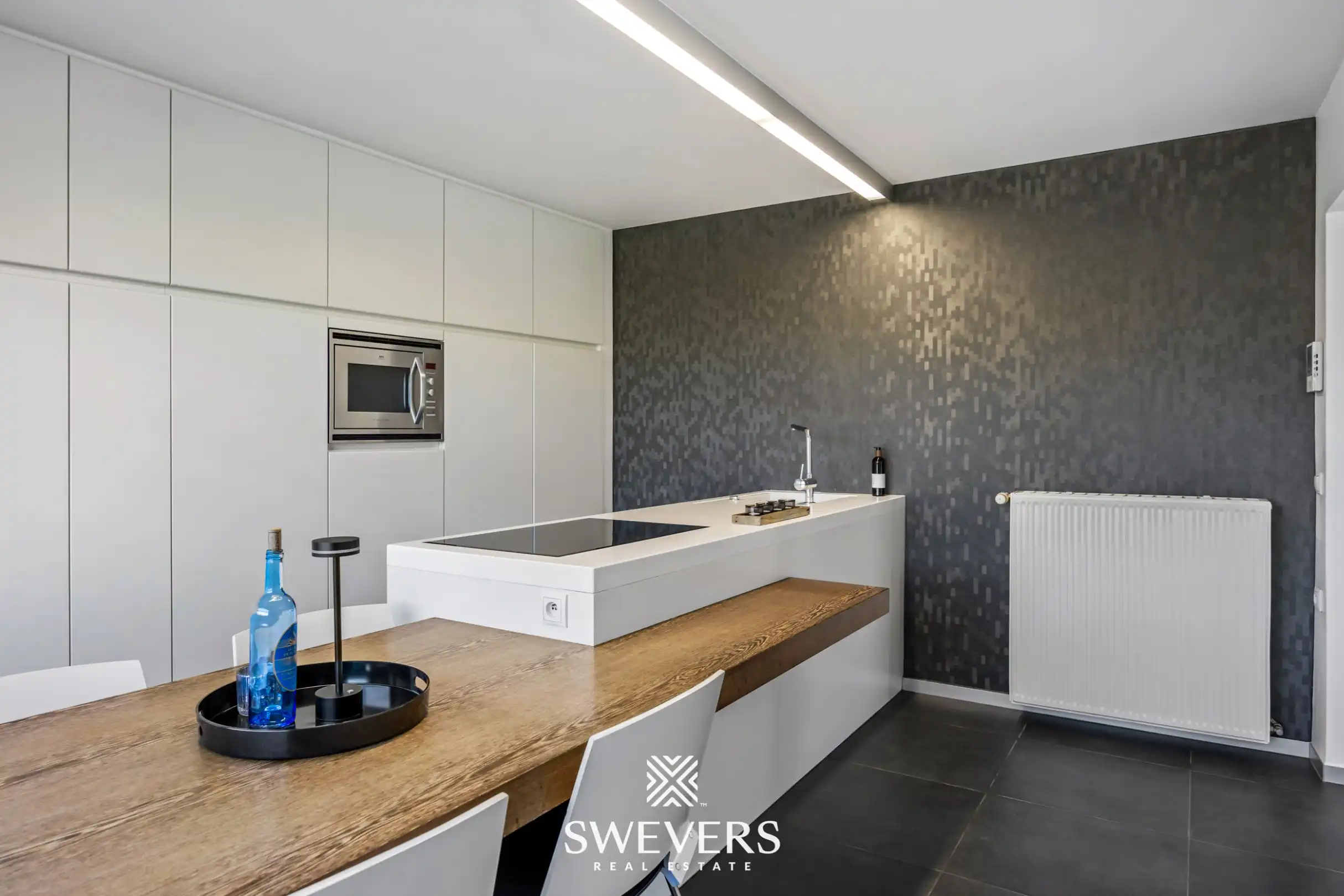 Instapklare open bebouwing met ruime tuin en prachtig uitzicht tussen de boomgaarden in Gingelom foto 12