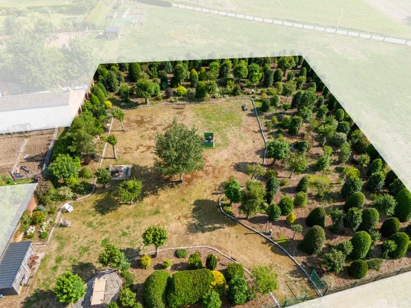 Bouwgrond met potentieel + uitgestrekt achterliggend perceel (weide/tuin) foto 3