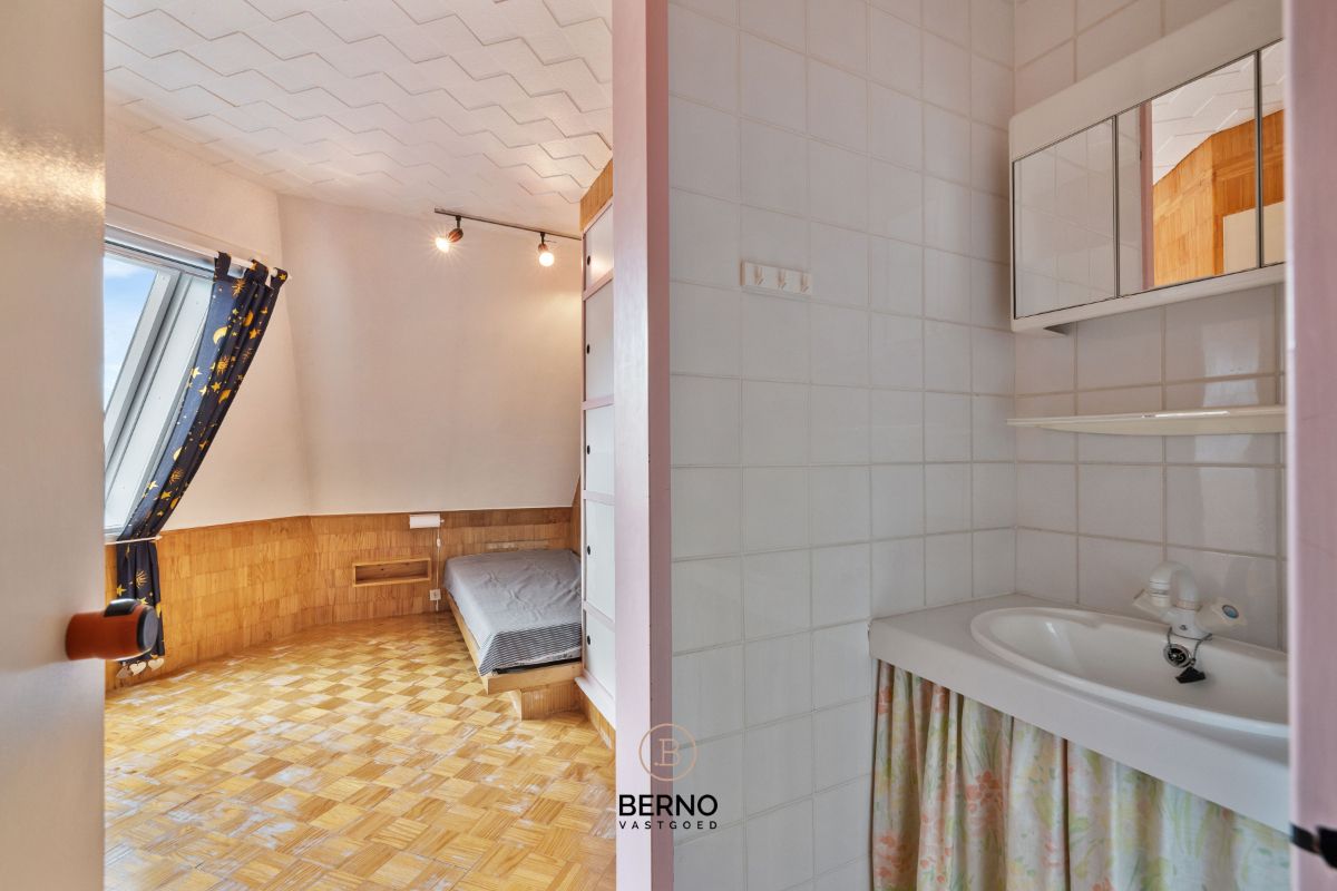 Te koop: Energiezuinige architectenwoning met tuin in Grembergen foto 14