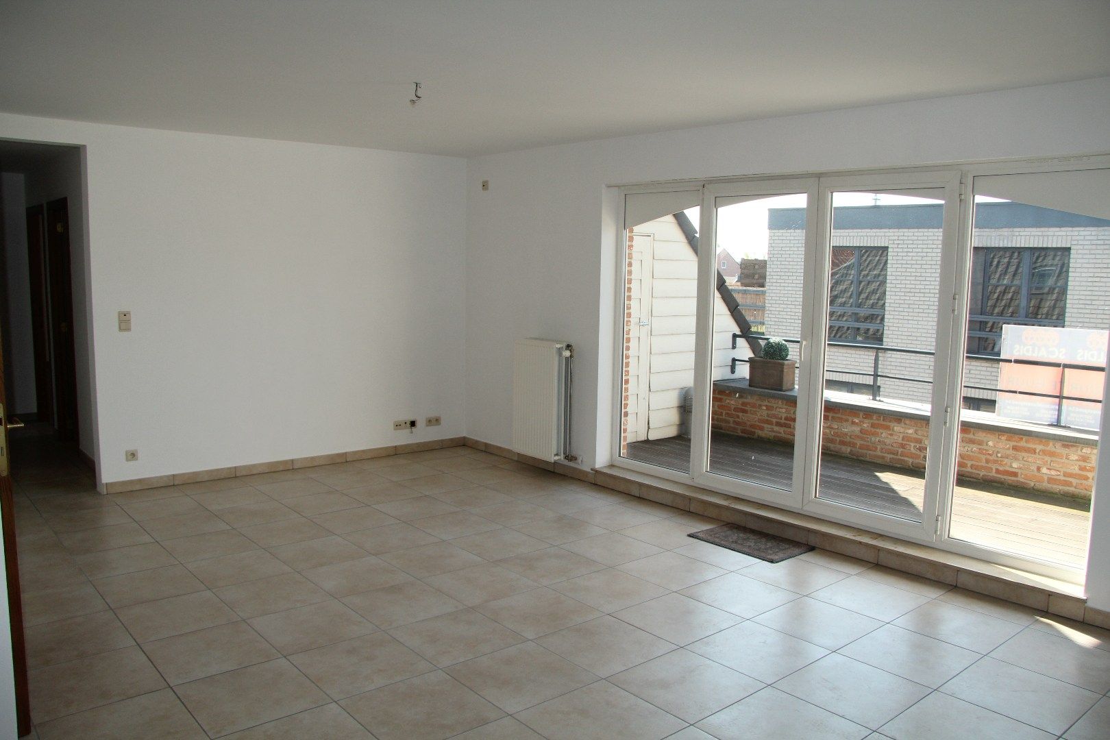 Ruim dakappartement met 2 slk, terras en garage foto 3