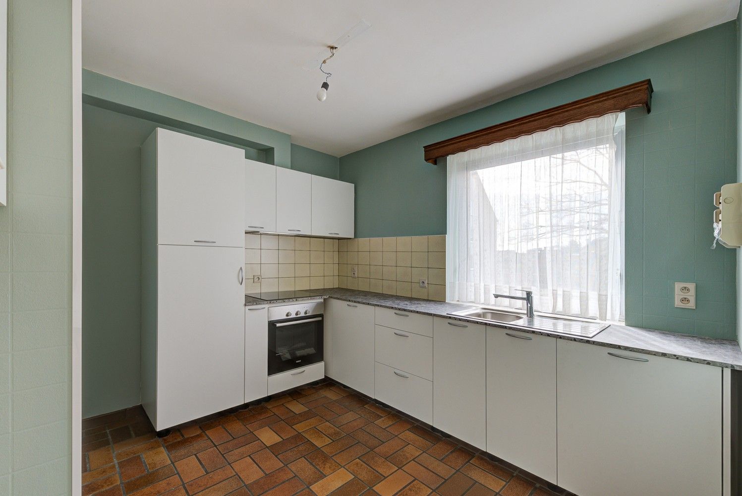 VERZORGD APPARTEMENT MET 3 SLAAPKAMERS, RUIM TERRAS EN AUTOSTAANPLAATS NABIJ HET CENTRUM VAN BILZEN foto 5