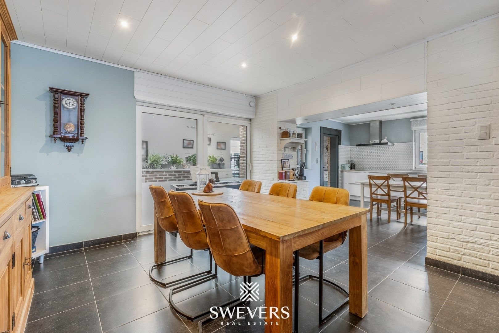 Gezellige woning met veranda, garage & zonnige tuin foto 6