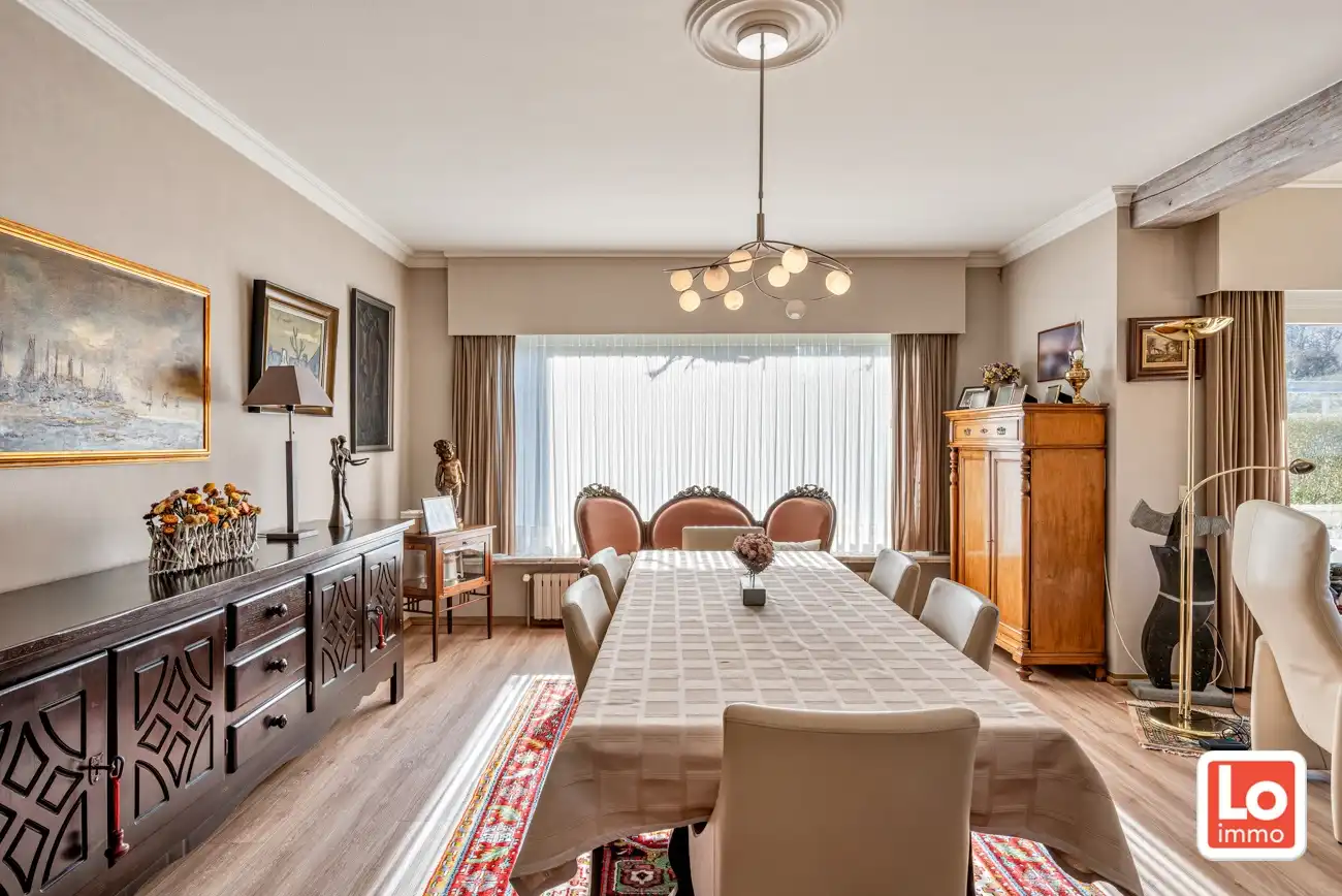 Degelijke open gelijkvloerse woning met inpandige garage en grote tuin op een groene toplocatie in Beervelde! foto 11